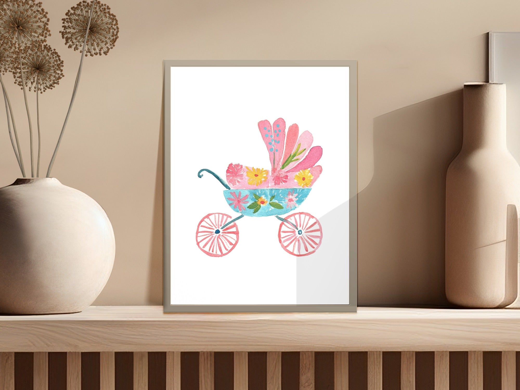 Watercolor illustration of a pink baby carriage with flowers.