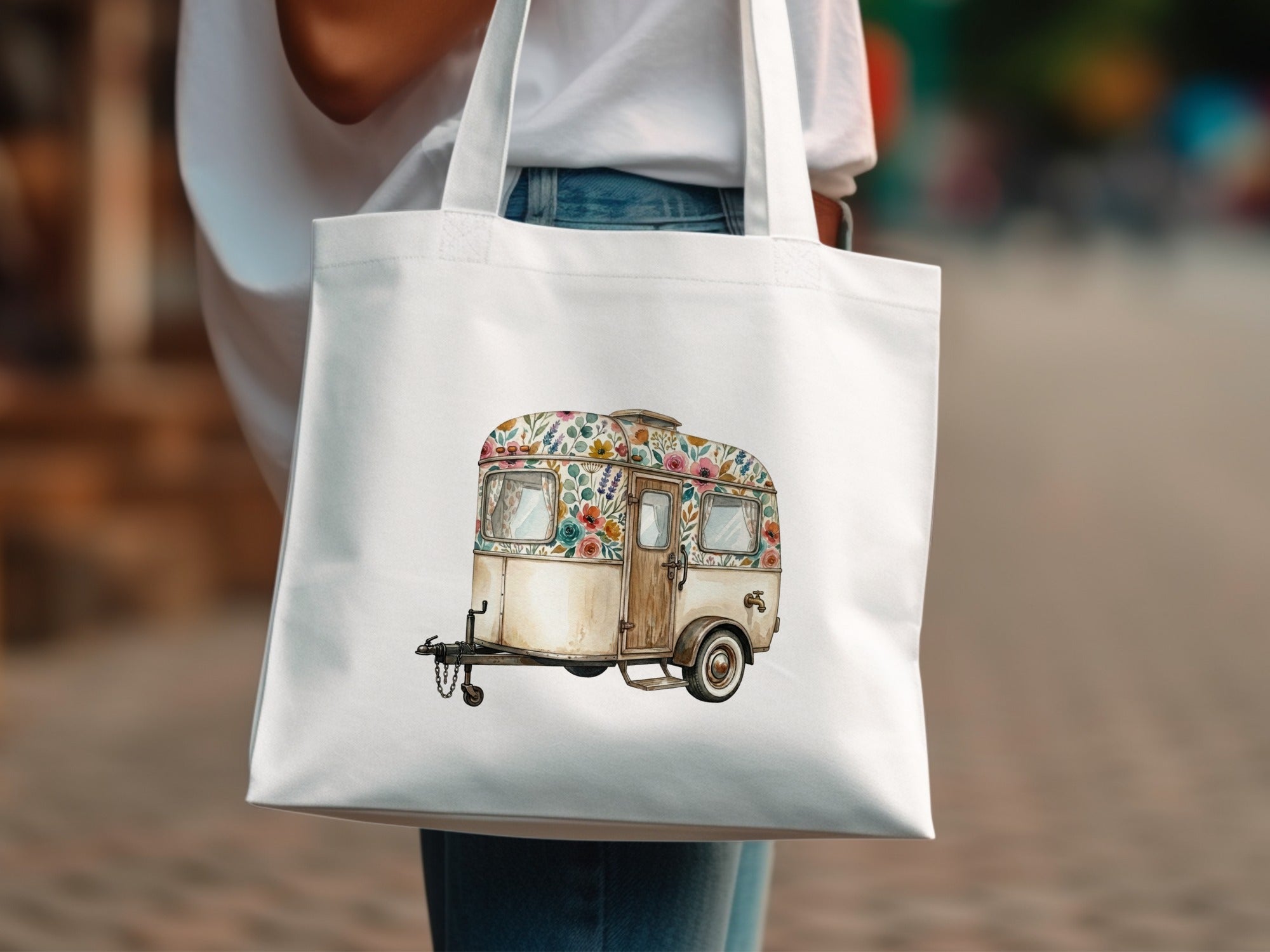 White tote bag with floral trailer illustration.
