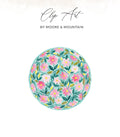 Watercolor soccer ball with pink flowers on a pastel background.