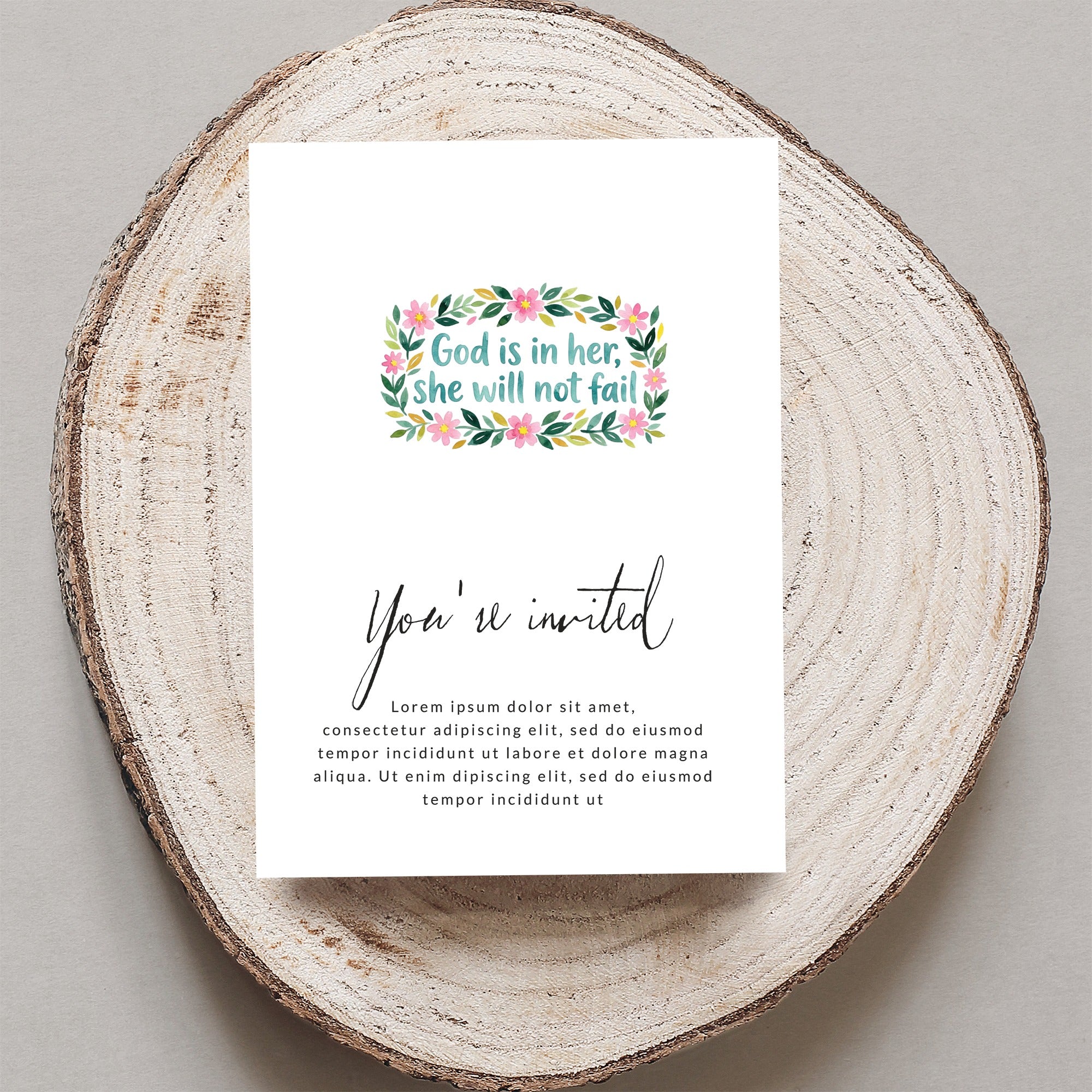 Invitation card with floral wreath and "God is in her, she will not fail" text.