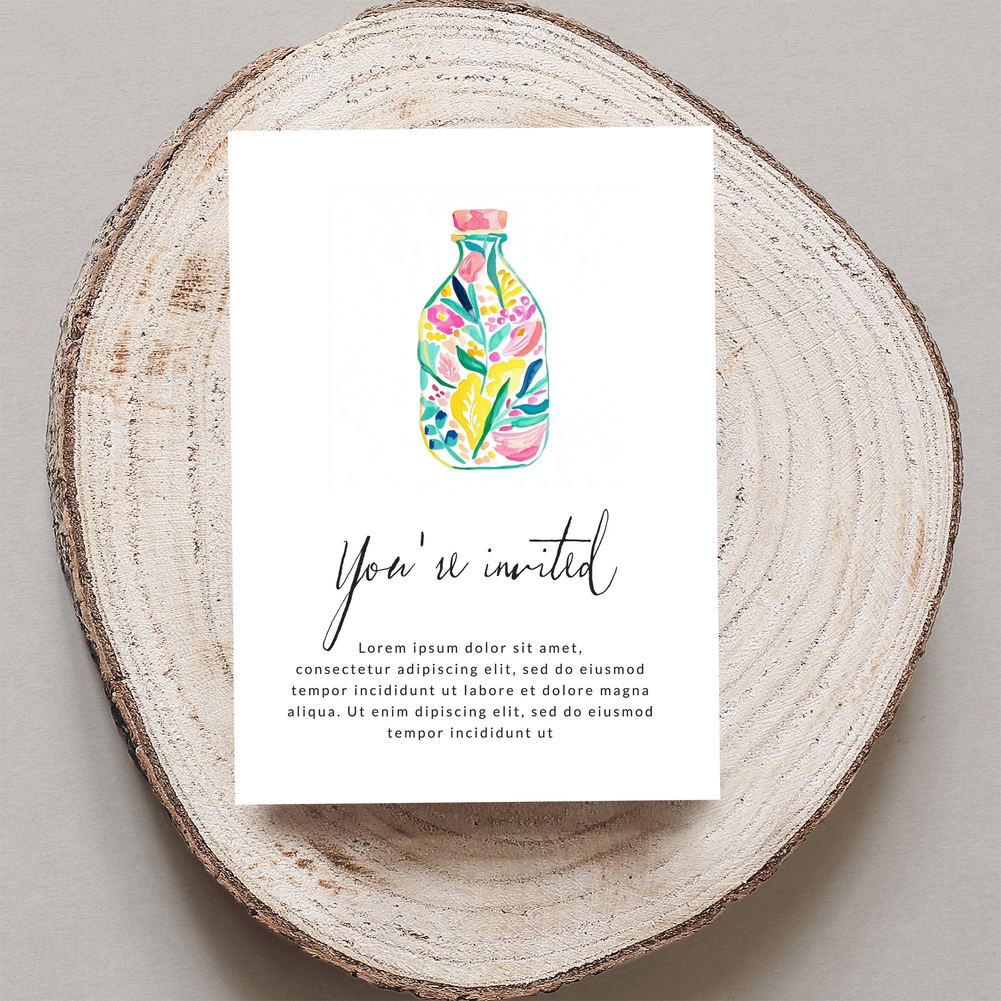 Invitation with colorful floral bottle illustration and placeholder text.