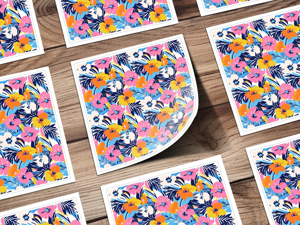 Floral pattern stickers with pink, blue, and yellow flowers on a wooden background.