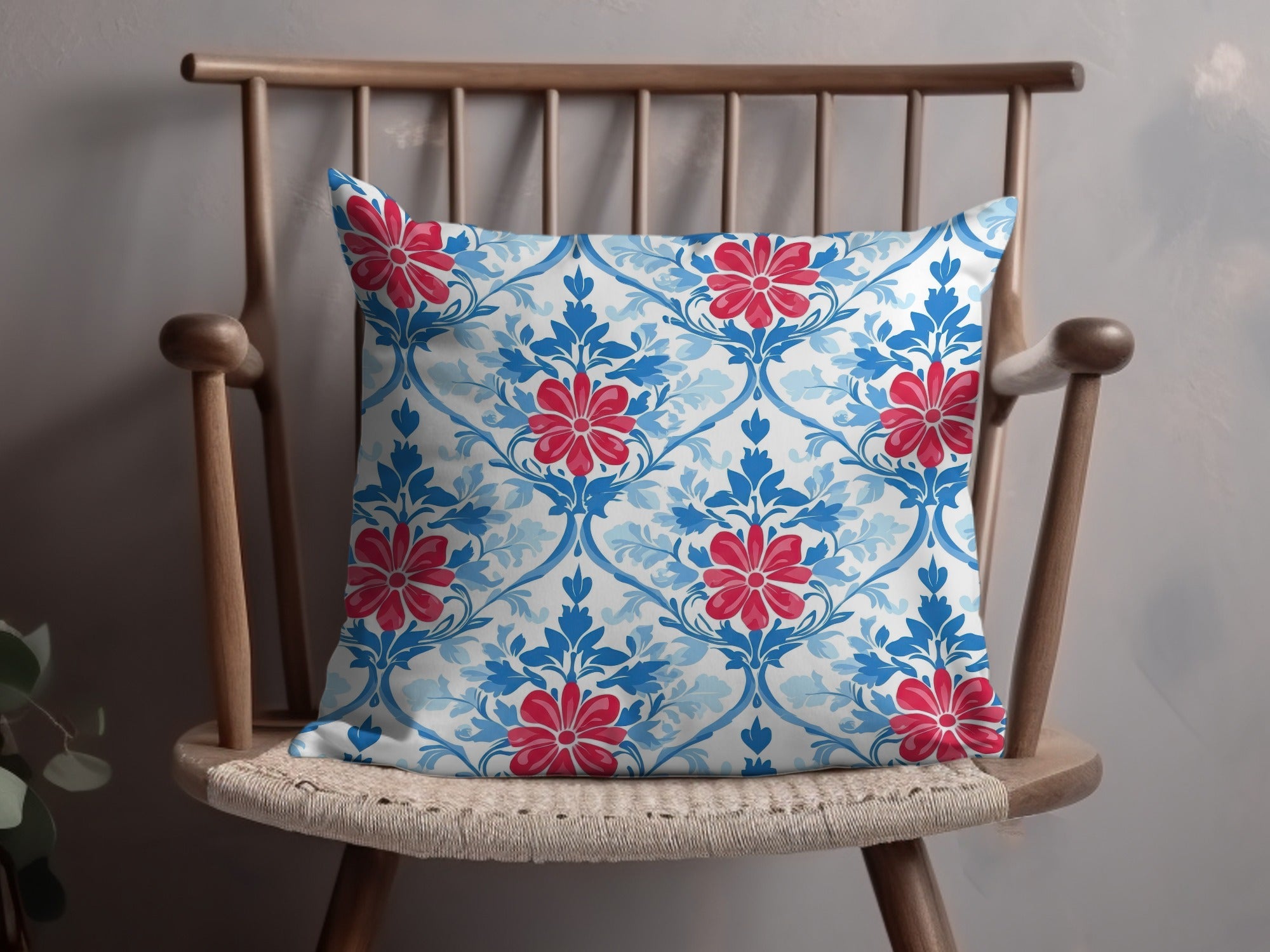 Decorative throw pillow with a blue and red floral damask pattern.