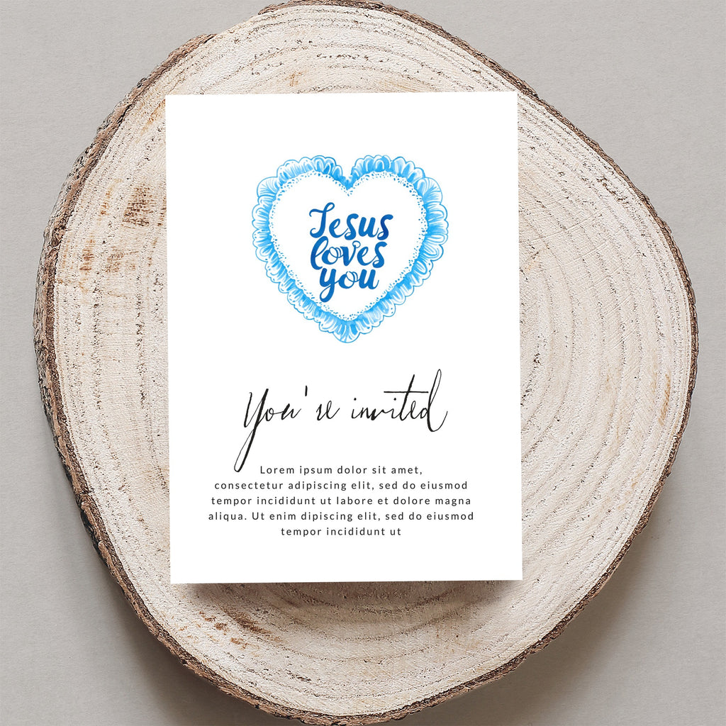 Card with "Jesus loves you" and "You're invited" text on wood slice.