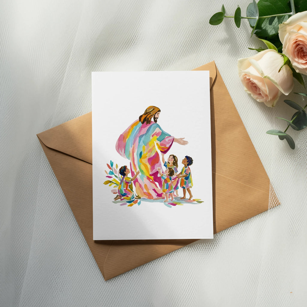 Jesus with children painted in rainbow colors, on a card over an envelope.