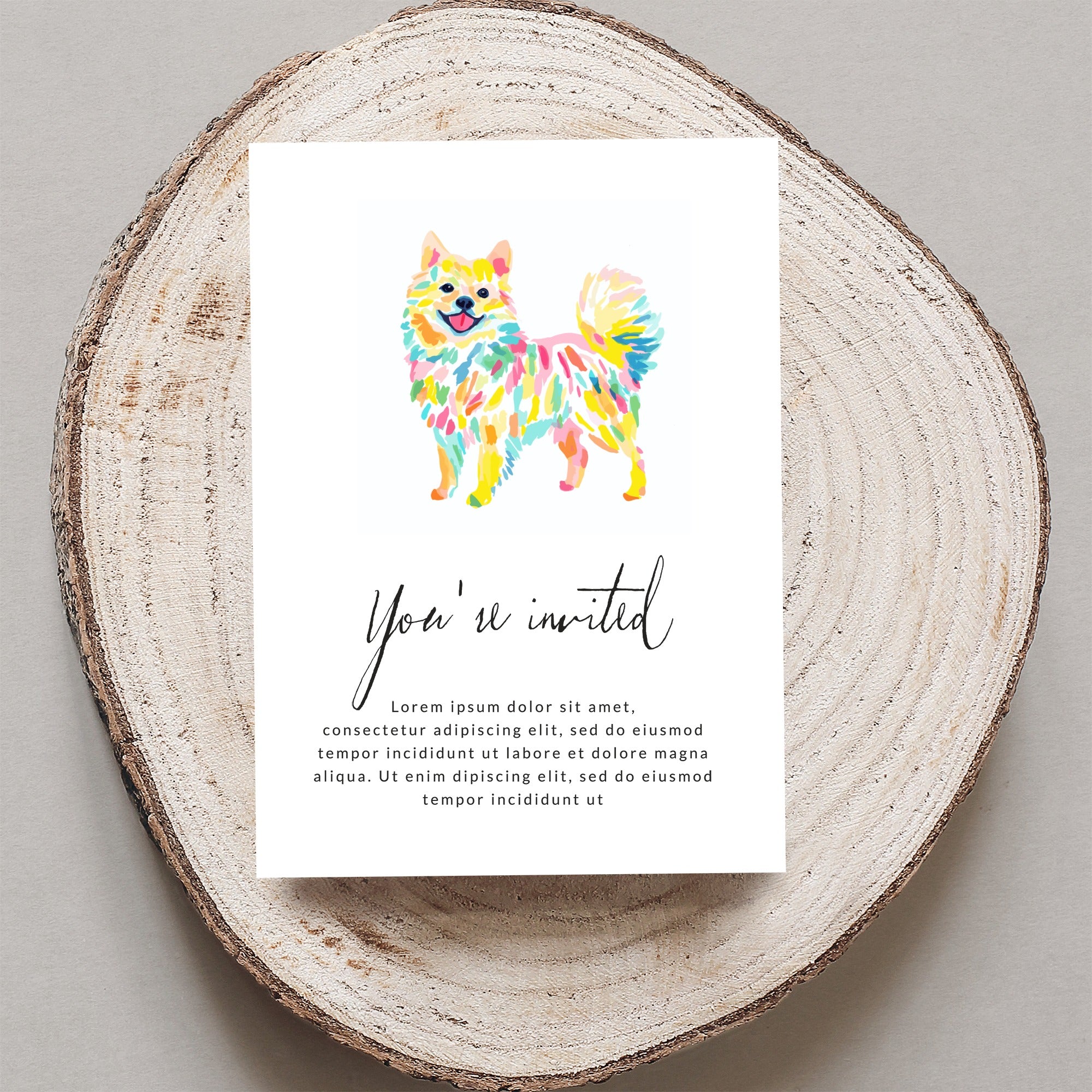 Colorful Pomeranian dog on invitation, "You're invited" text.