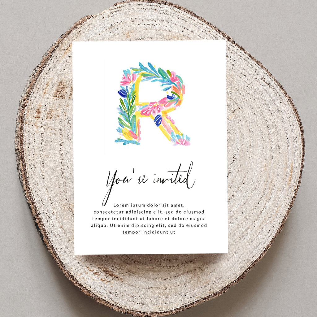 Invitation with a floral letter "R" and placeholder text.