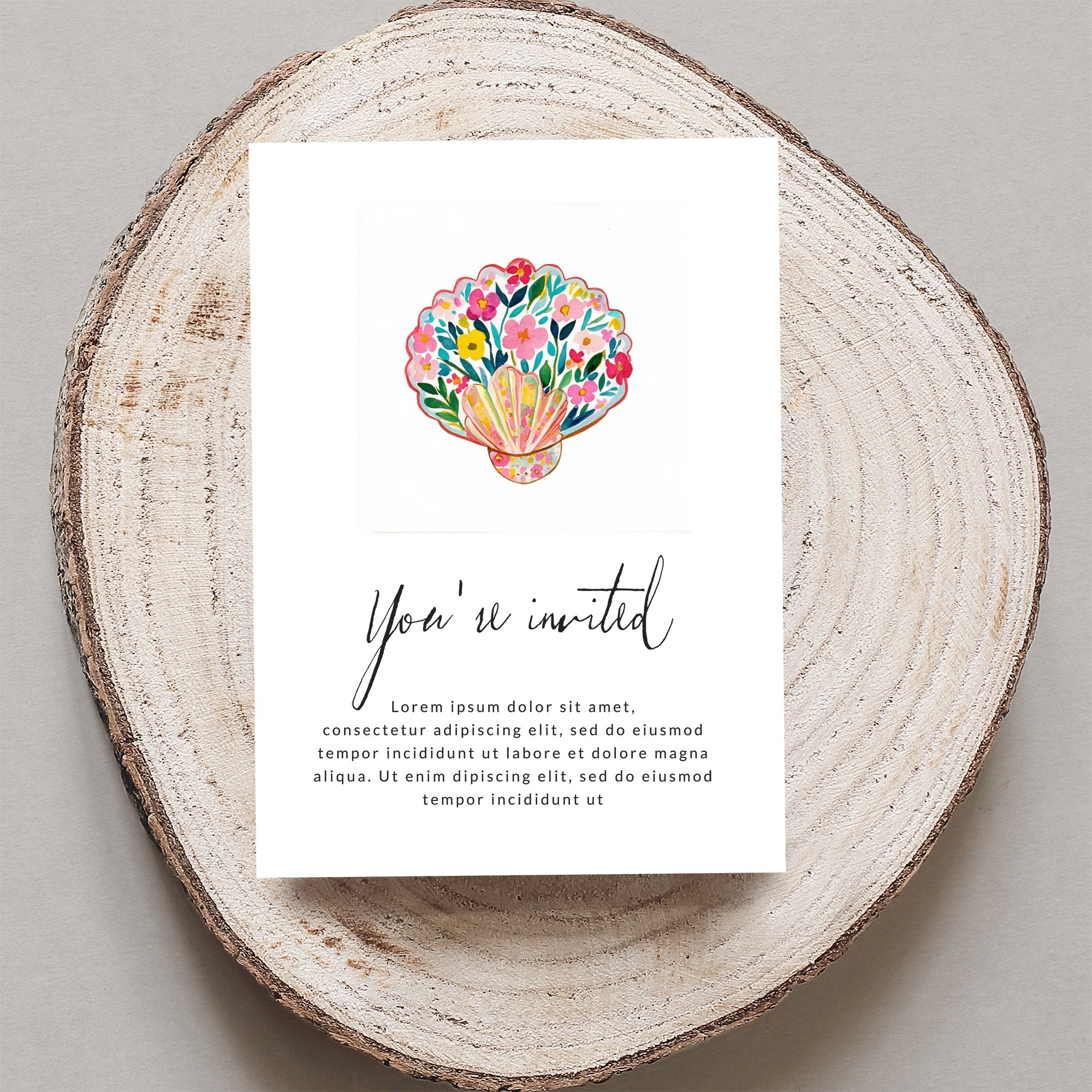 Invitation with floral seashell illustration and placeholder text.