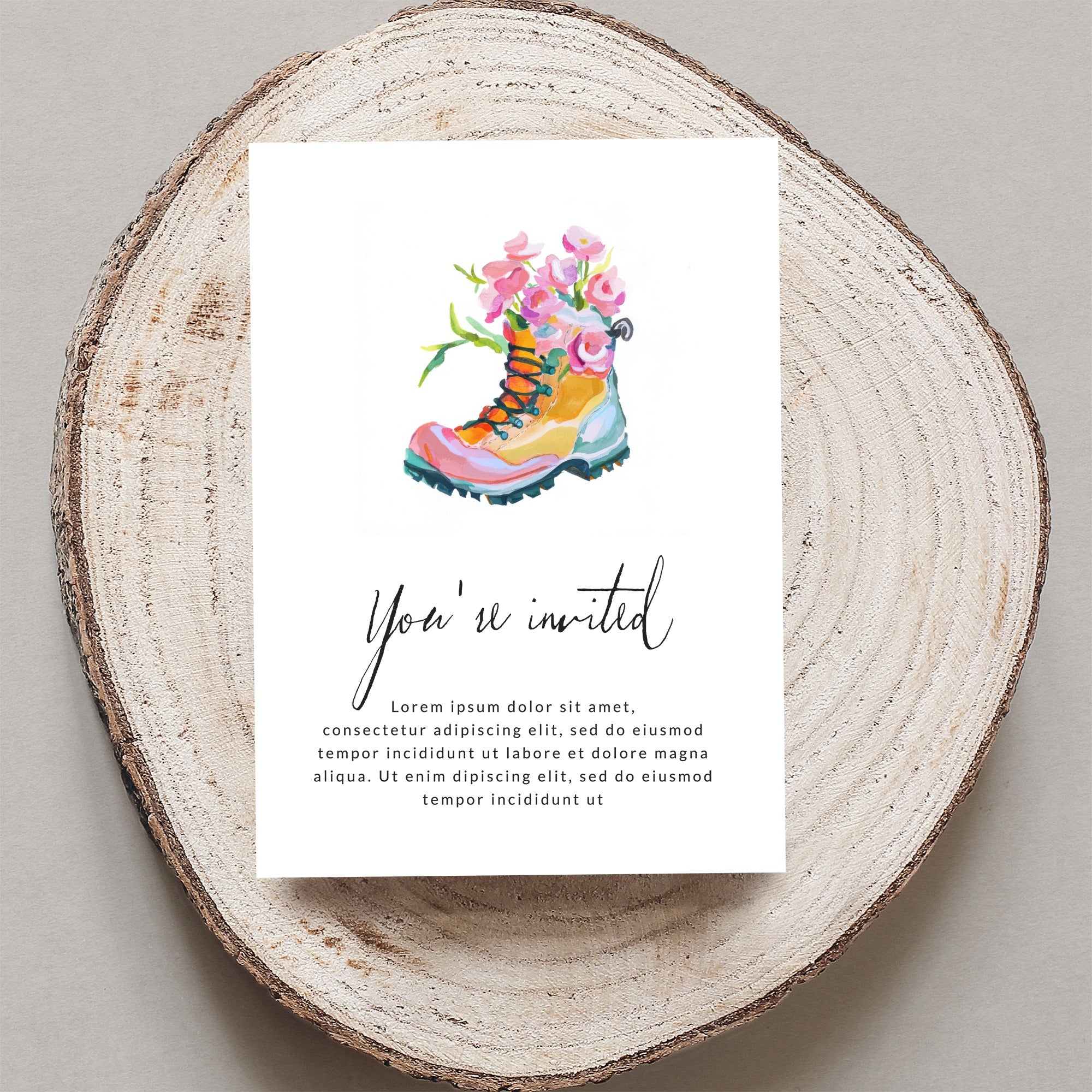 Watercolor boot with flowers, "You're invited" text, and placeholder text.