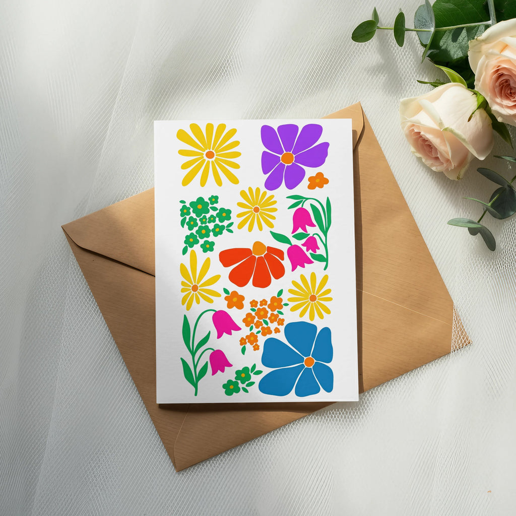 Card with colorful floral illustrations on a brown envelope.