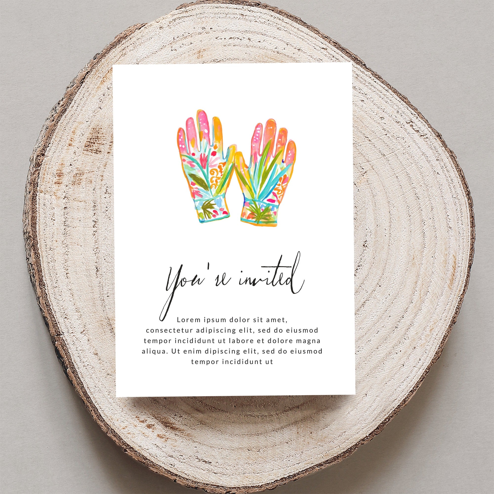 Floral gardening gloves on invitation with "You're invited" text.
