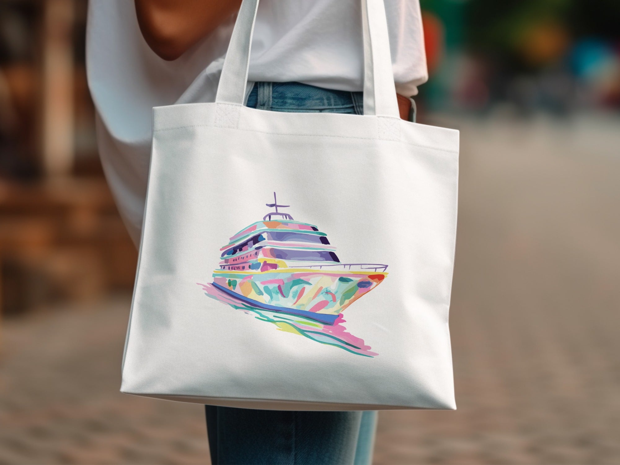 White tote bag with a colorful abstract yacht illustration.
