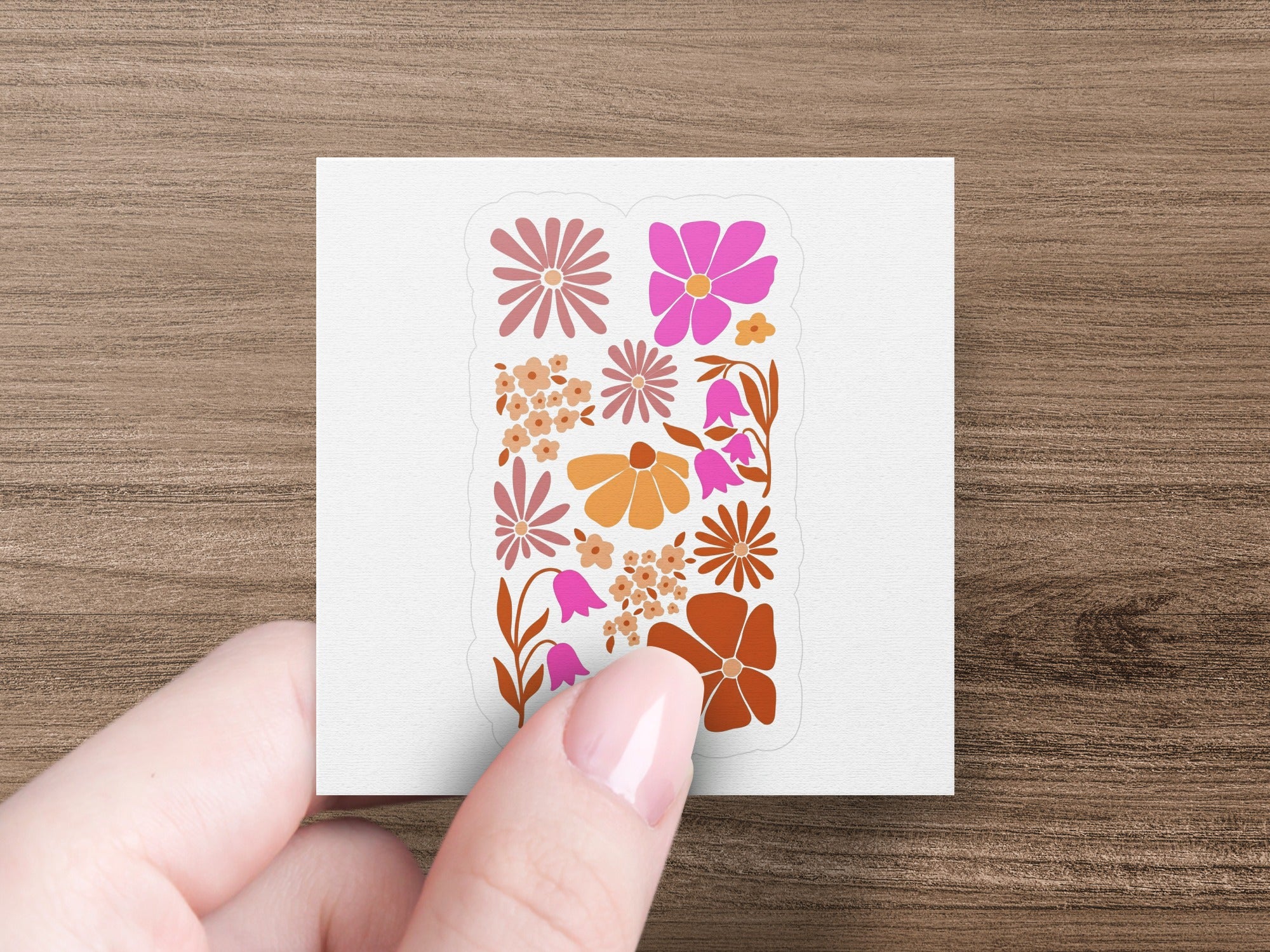 Sheet of floral stickers with various pink and orange flowers.