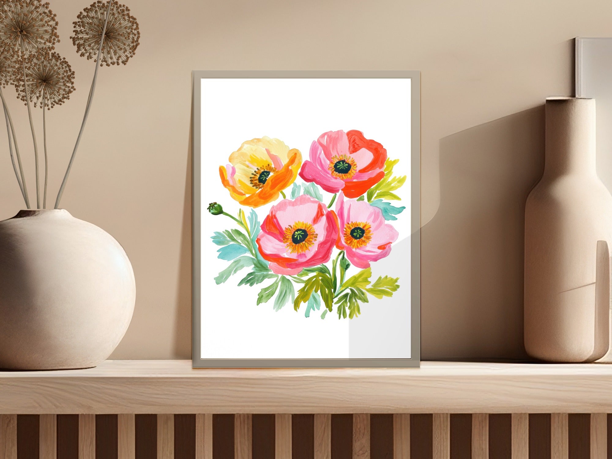 Watercolor poppies in a framed art print on a shelf.