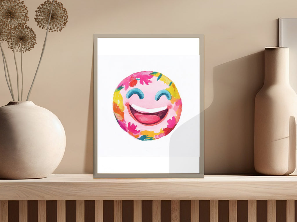 Watercolor smiley face with colorful flower petals and leaves.