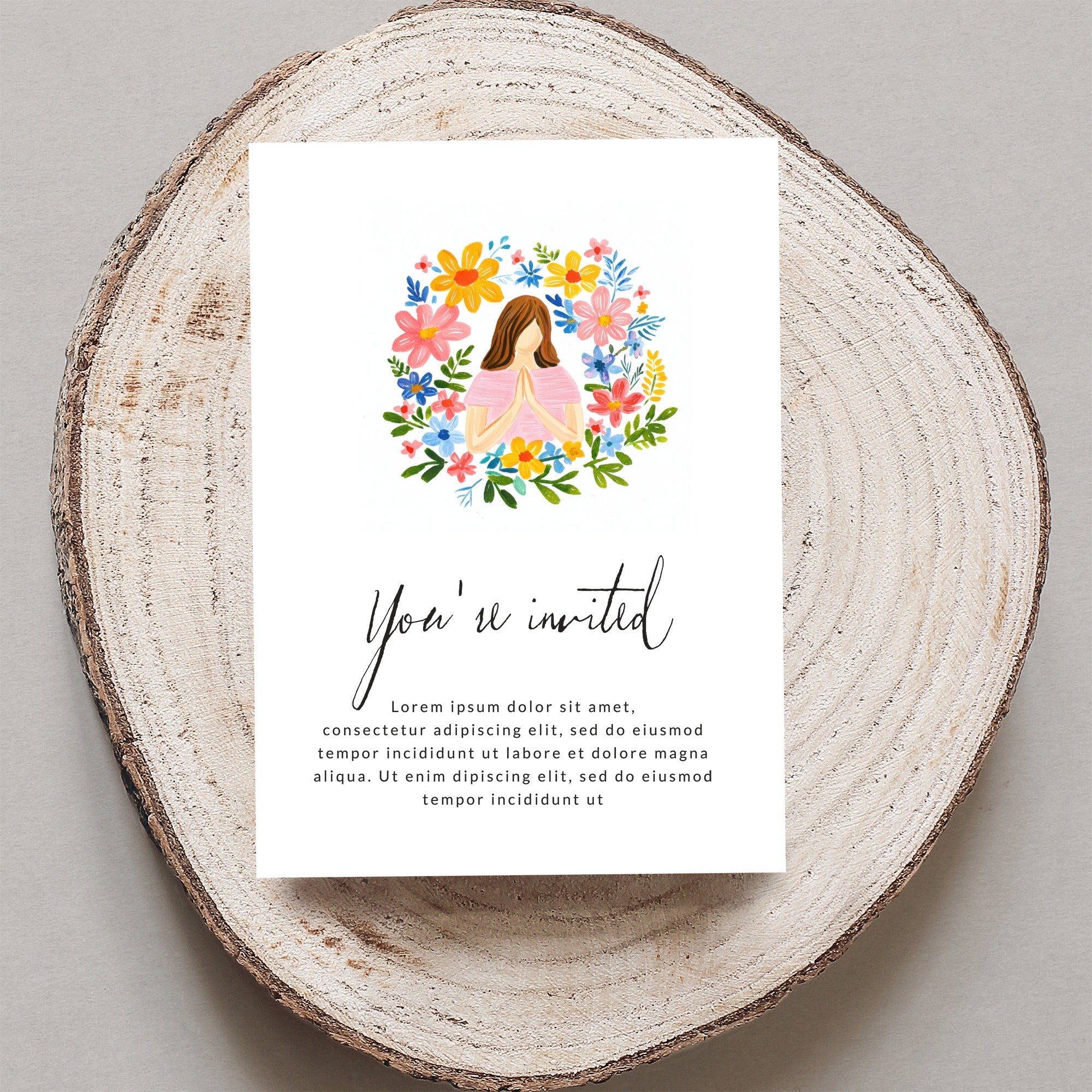 "You're invited" card with floral border and lorem ipsum text.