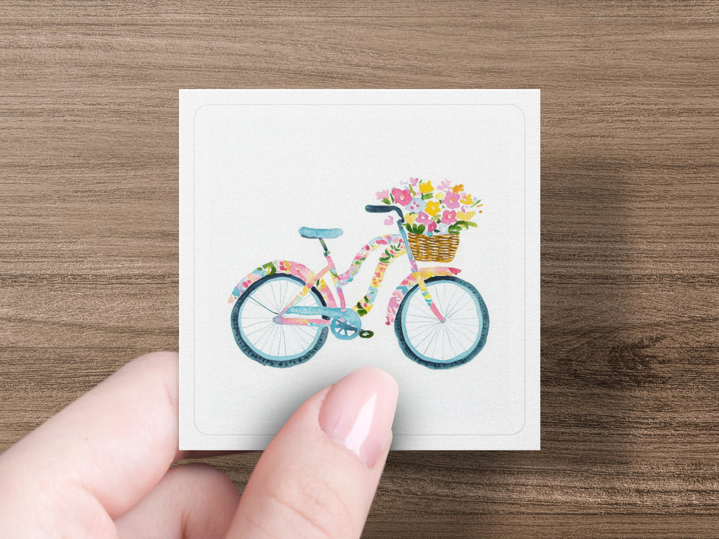 Watercolor bicycle with flower basket on wooden background.