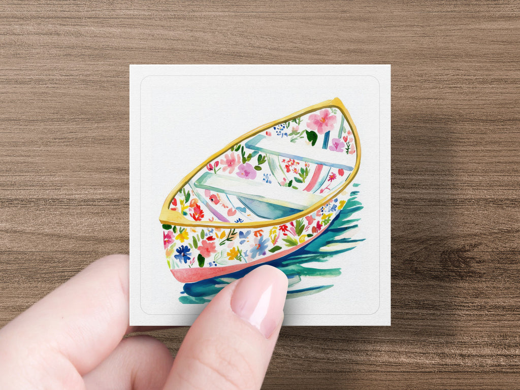 Watercolor painting of a floral rowboat on blue water.