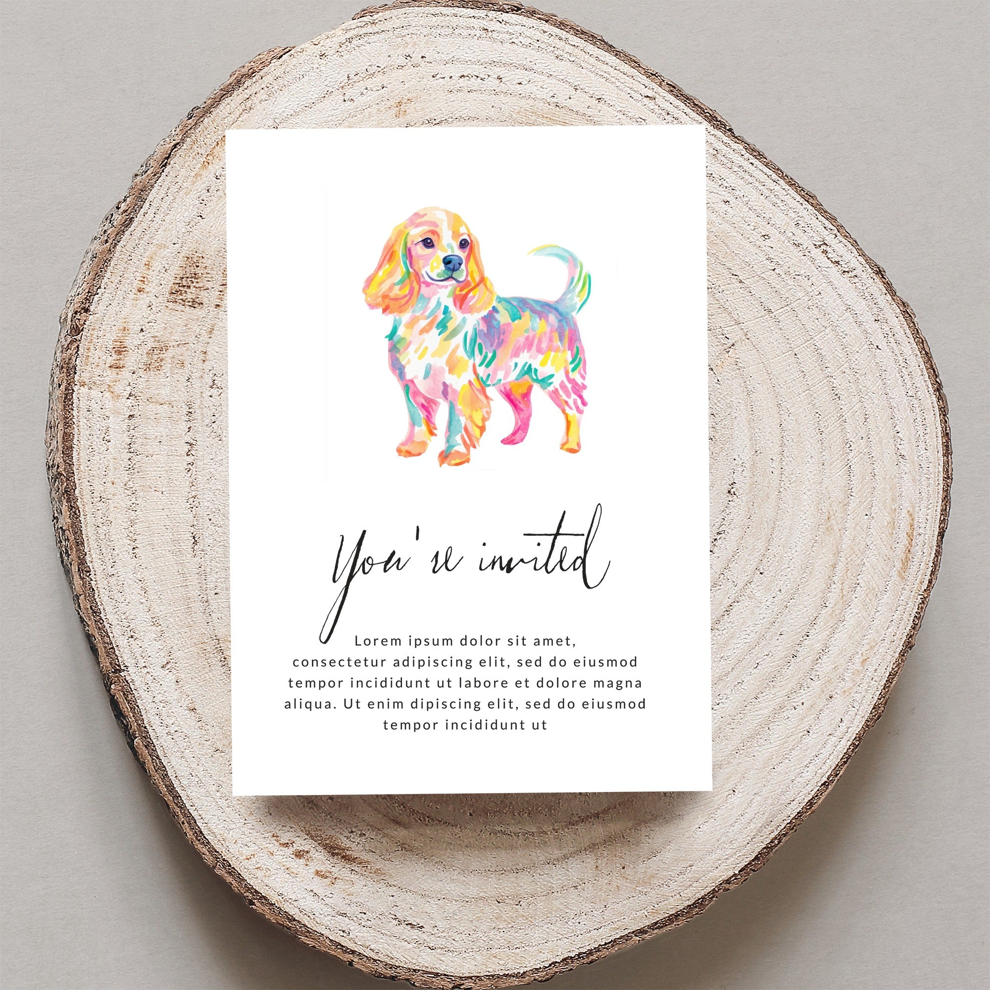 Watercolor dog illustration on invitation with "You're invited" text.