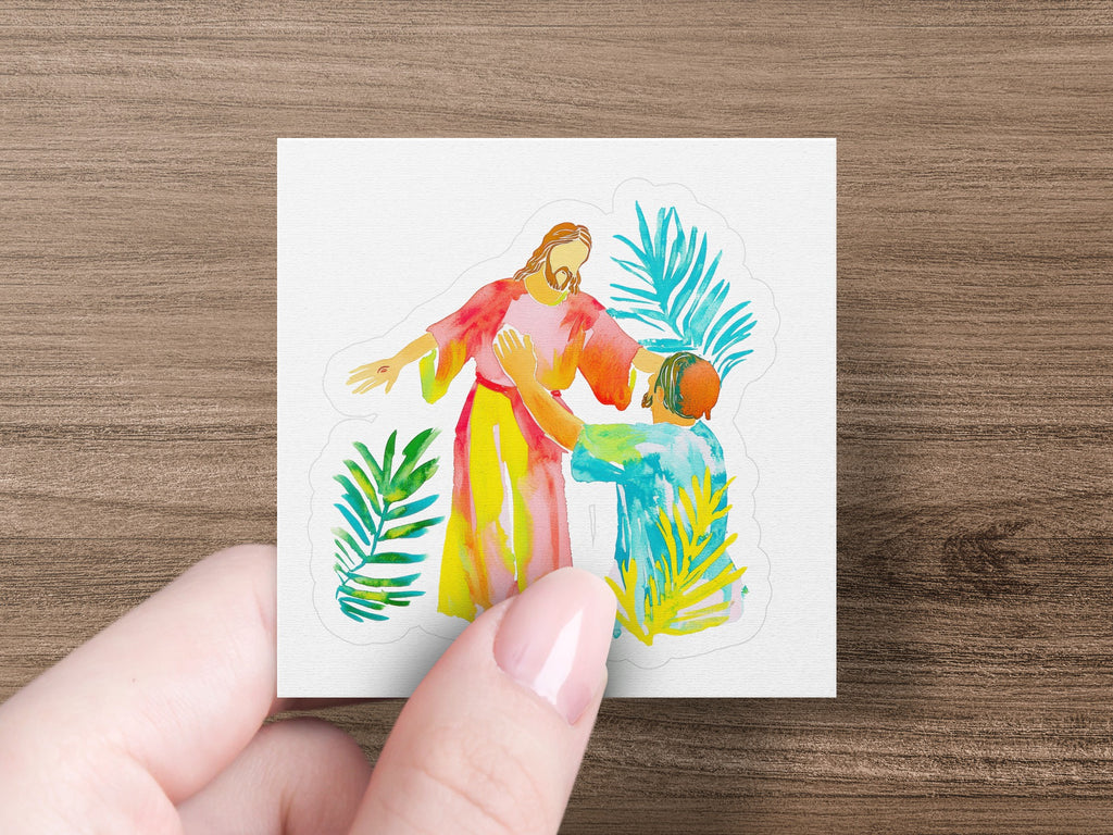 Jesus in colorful robes lifts a kneeling figure surrounded by palm leaves.