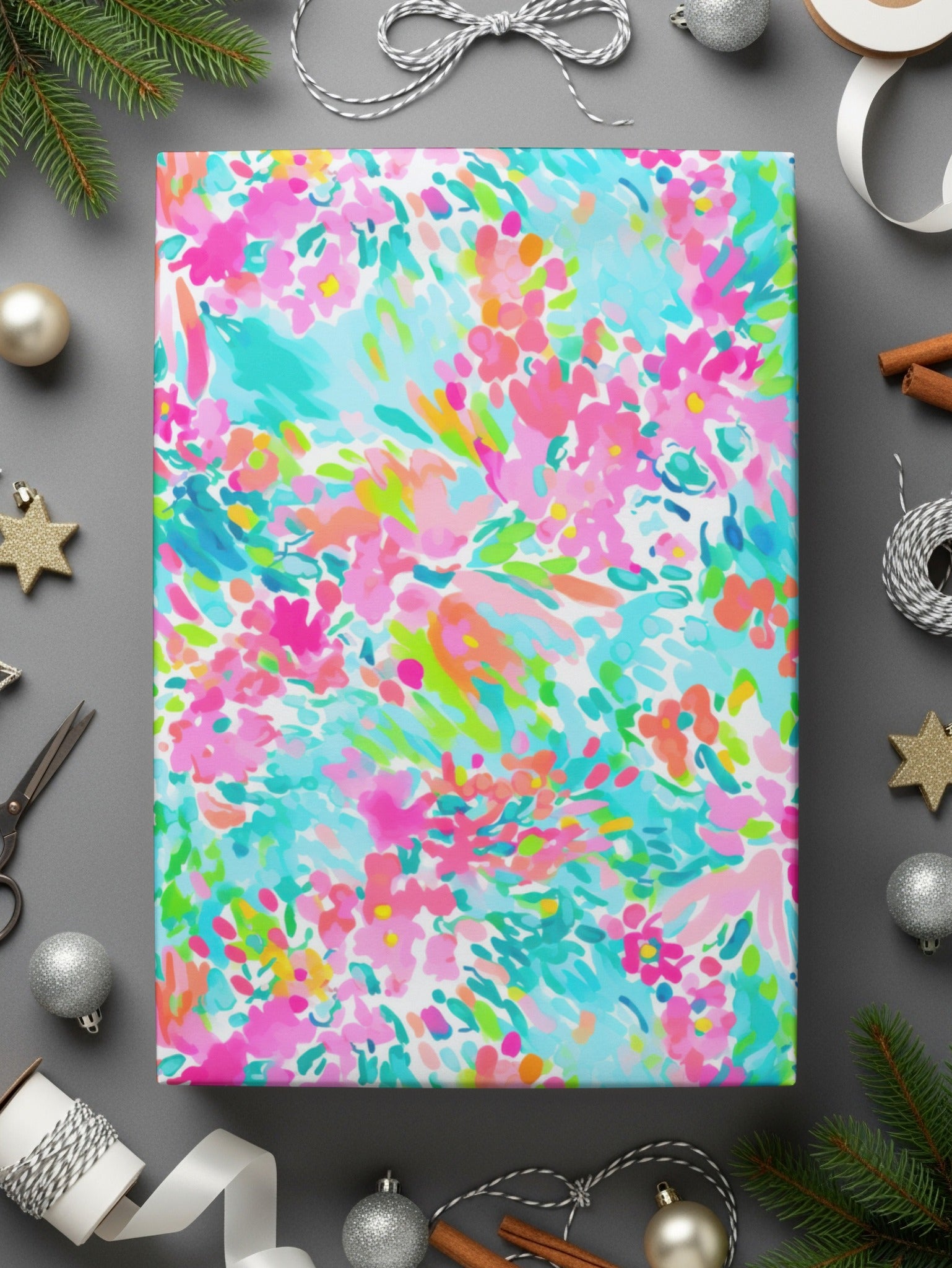 Colorful floral wrapping paper with pink, blue, and green accents.