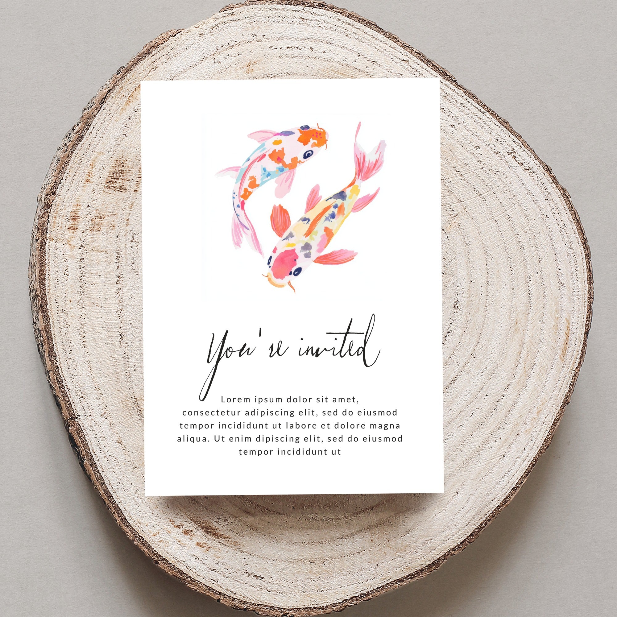 Invitation card with koi fish design and "You're invited" text.