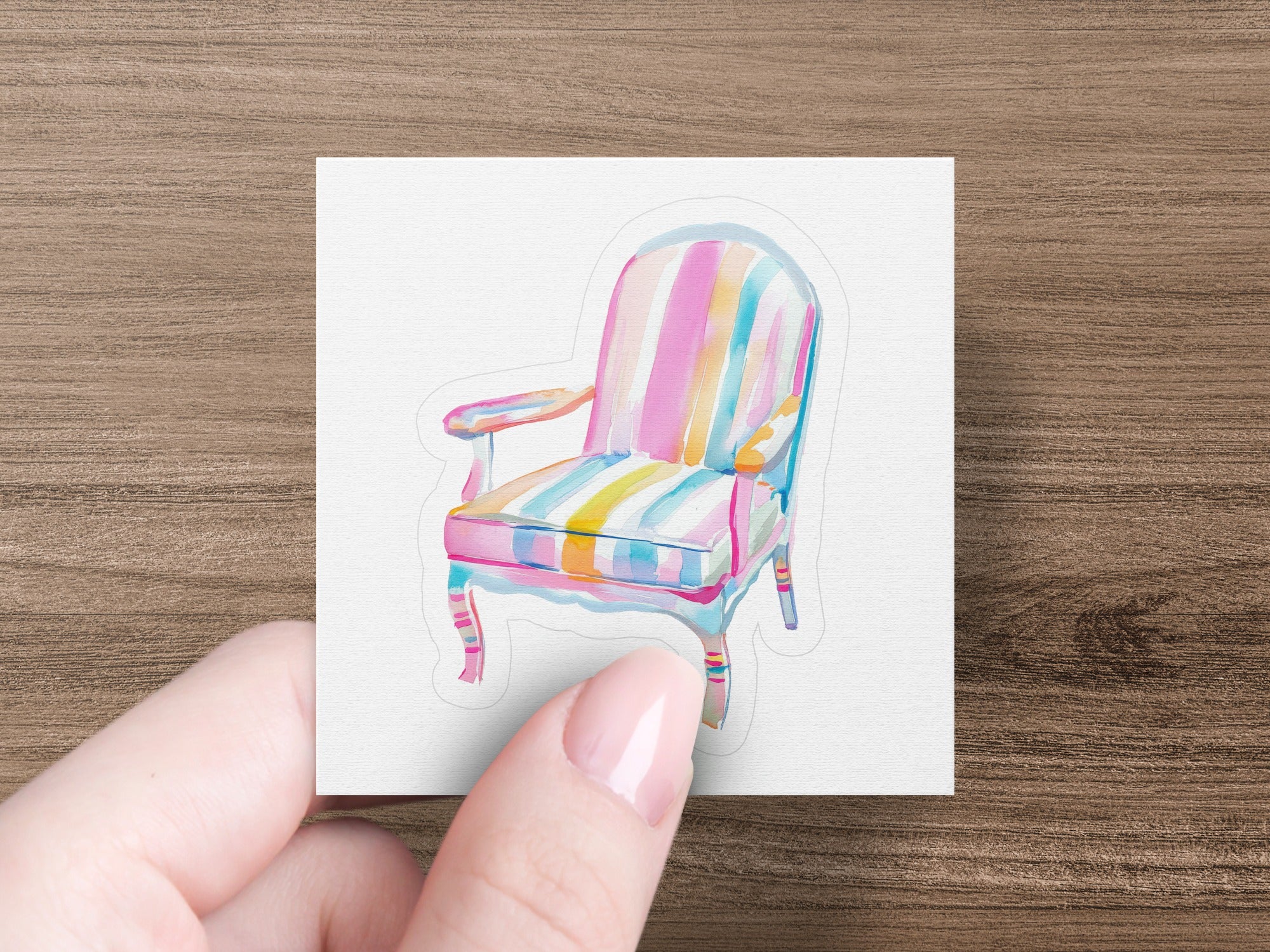 Striped armchair with colorful pink, blue, and yellow stripes.