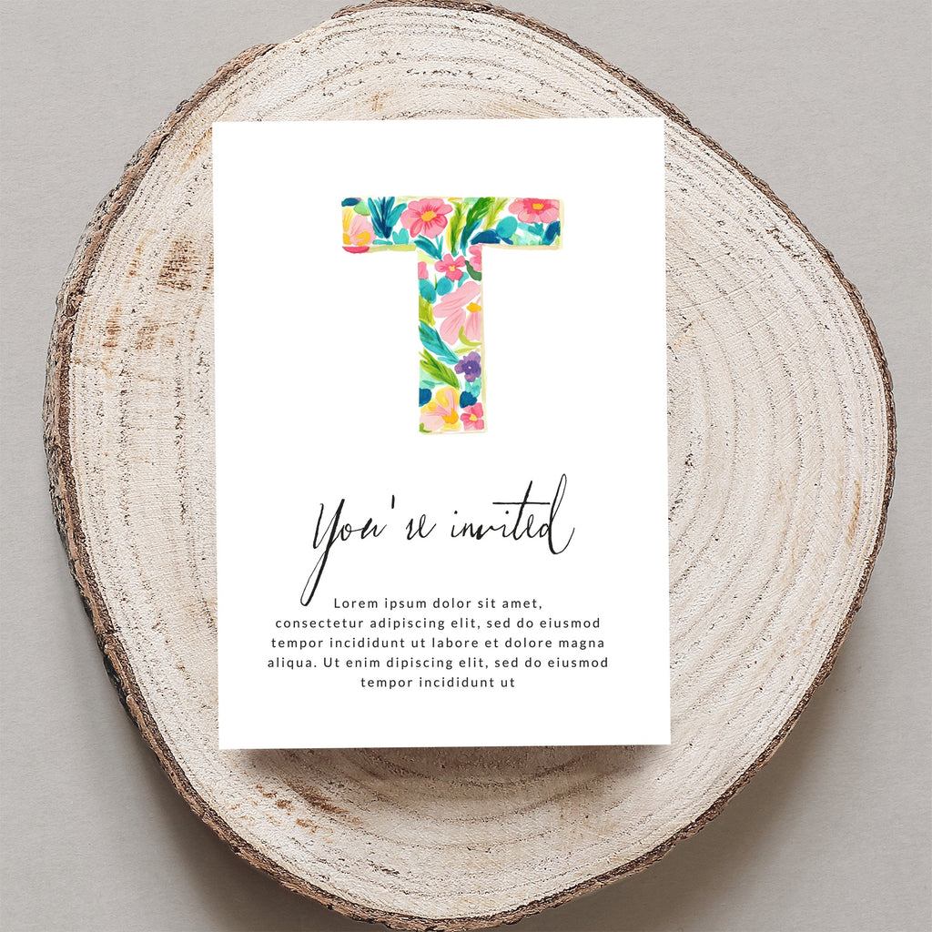 Floral letter "T" invitation with "You're invited" text.