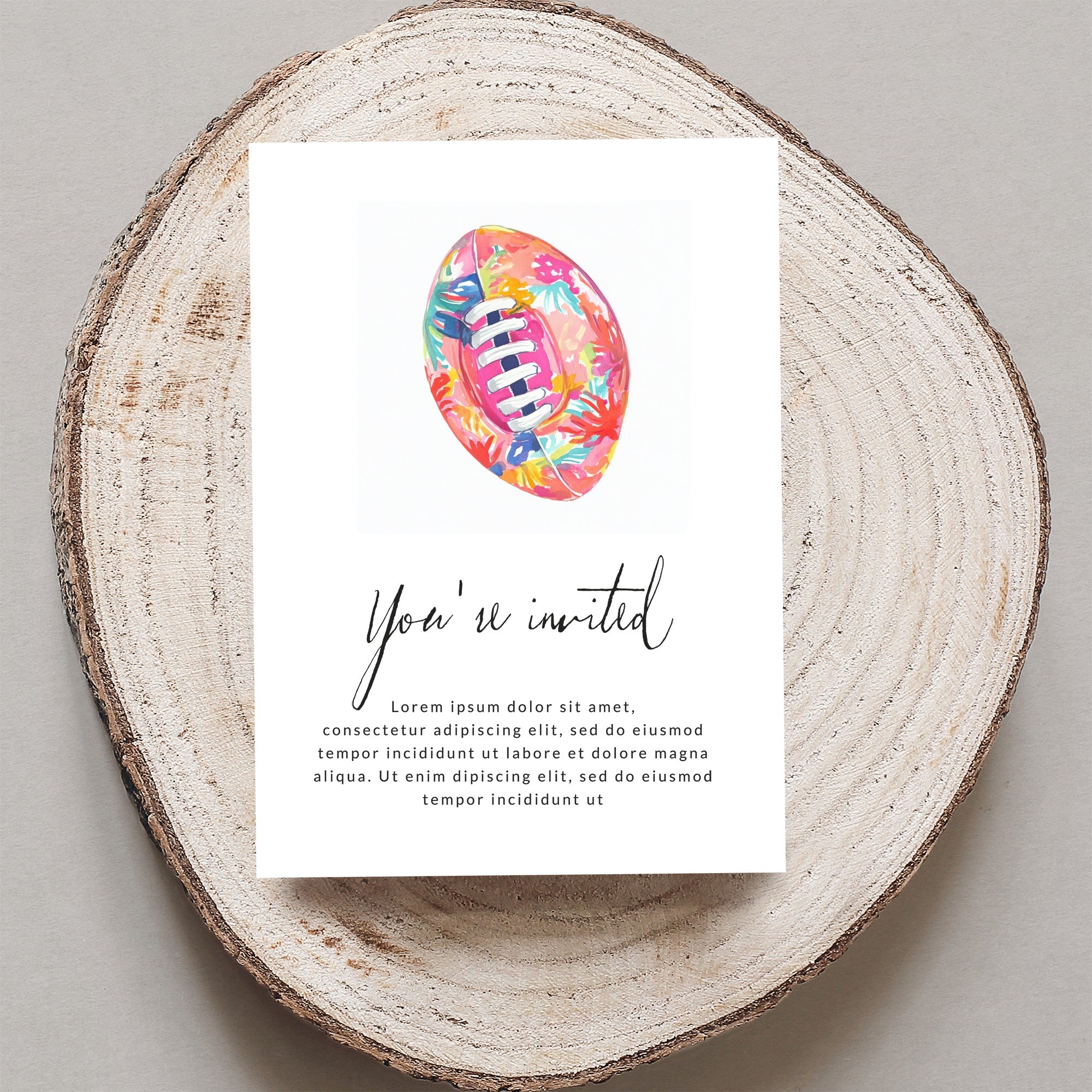 Invitation with floral football design and placeholder text.