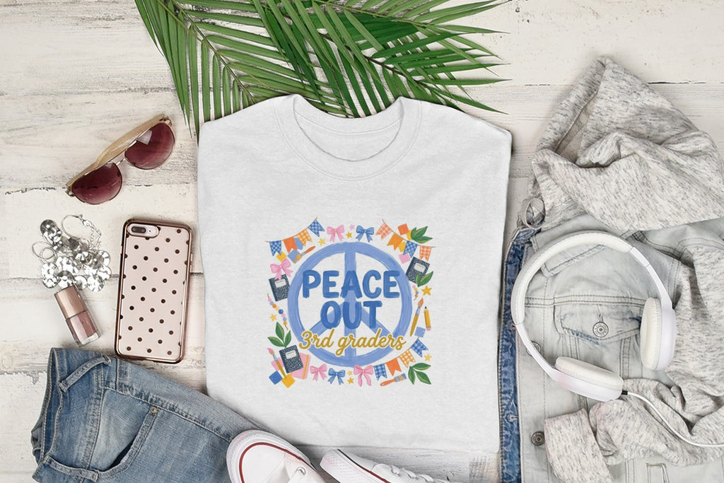White t-shirt with "Peace Out 3rd Graders" graphic, styled with jeans, headphones, and sunglasses.