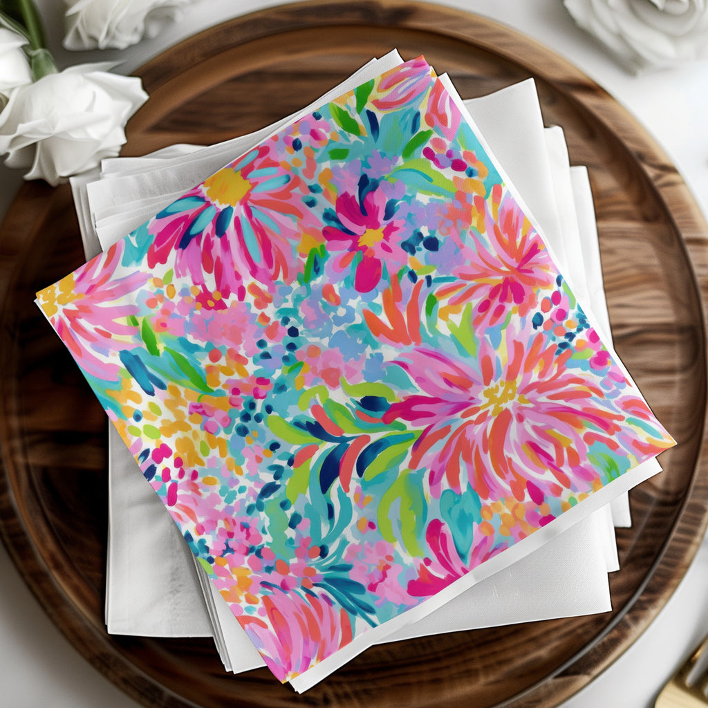 Colorful floral patterned napkins on a wooden tray.