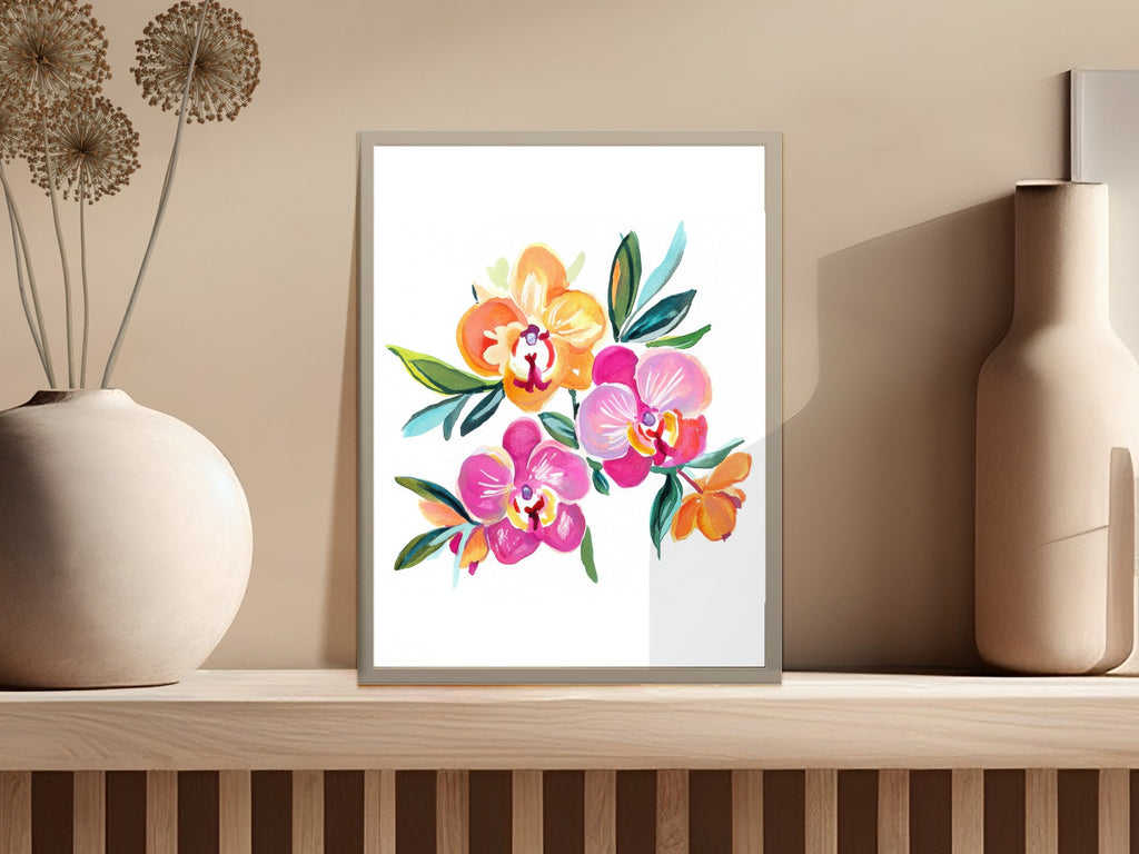 Colorful watercolor orchid bouquet in a frame on a shelf.