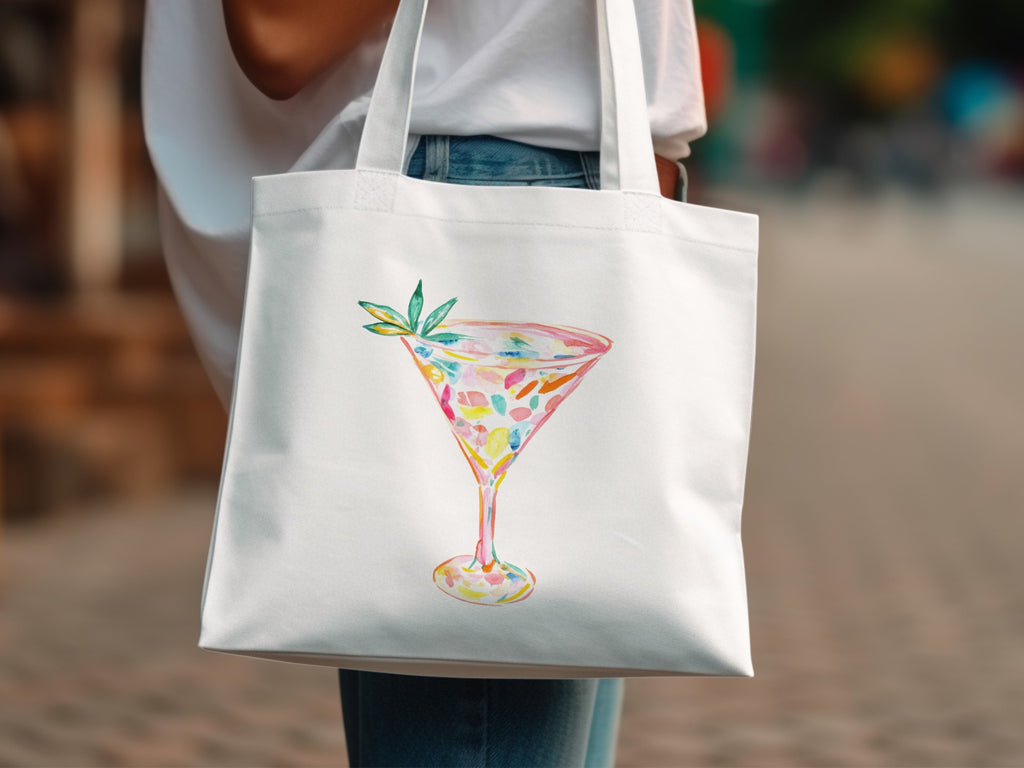 White tote bag with watercolor martini glass illustration.