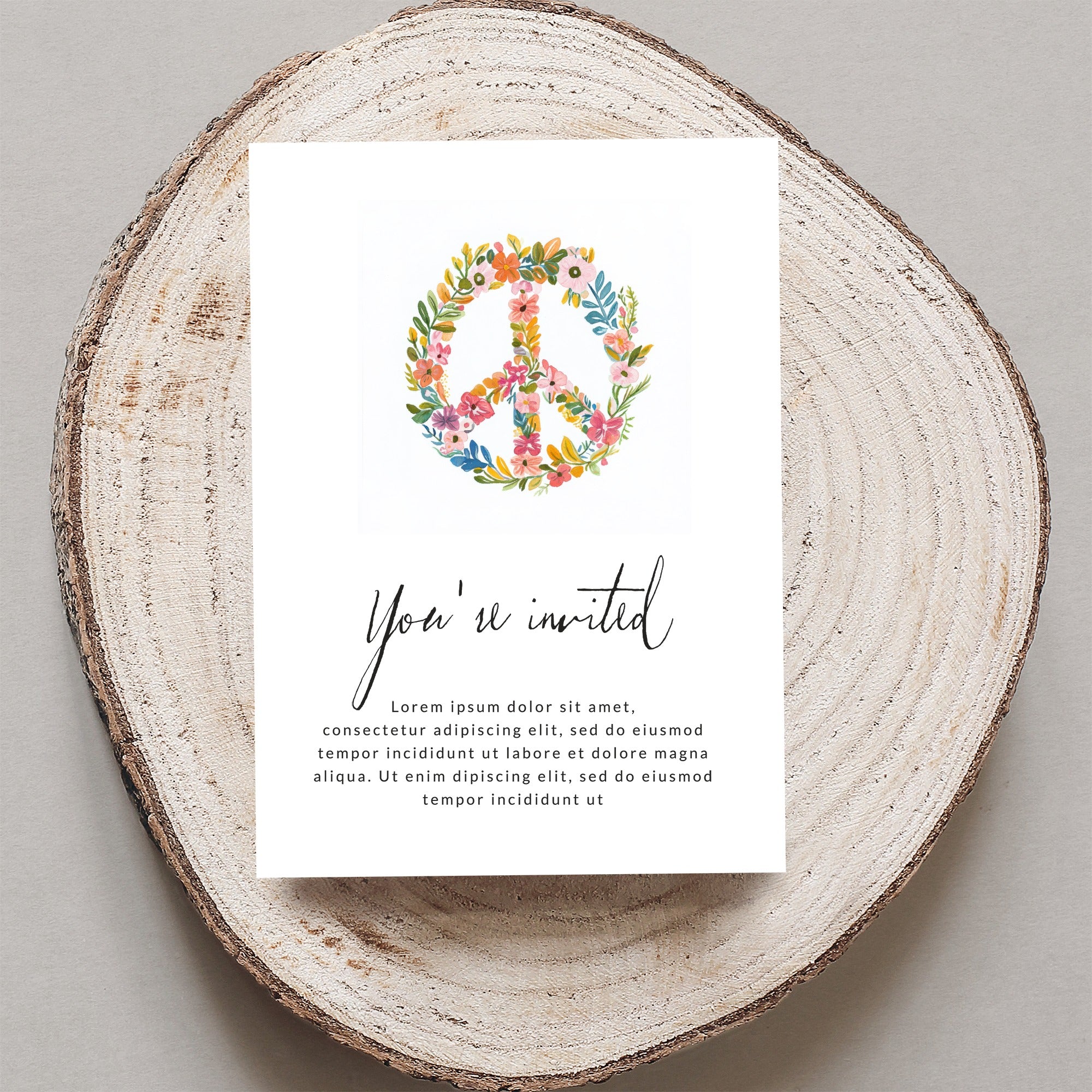 Invitation with floral peace sign and placeholder text.