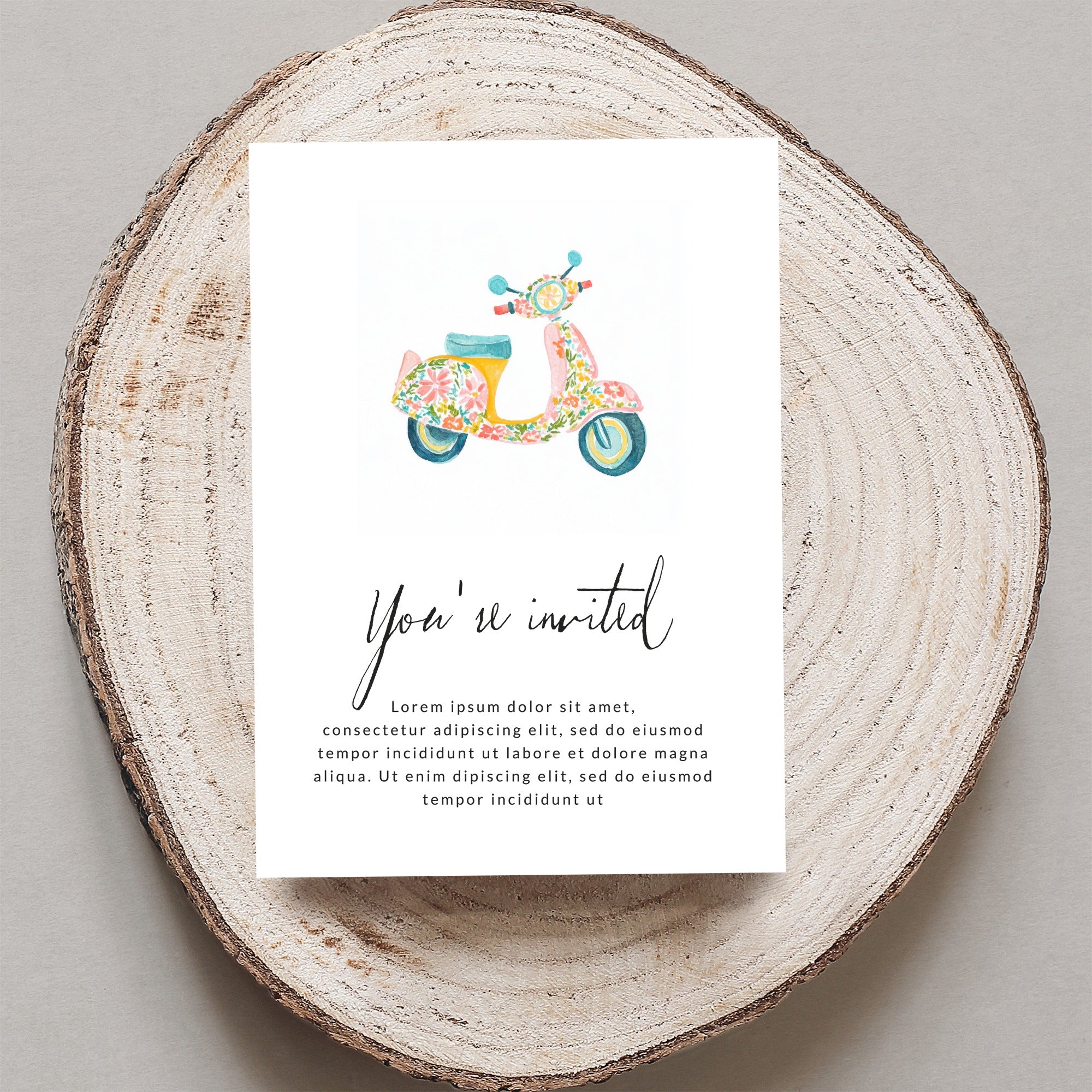 Invitation card with floral scooter and placeholder text.