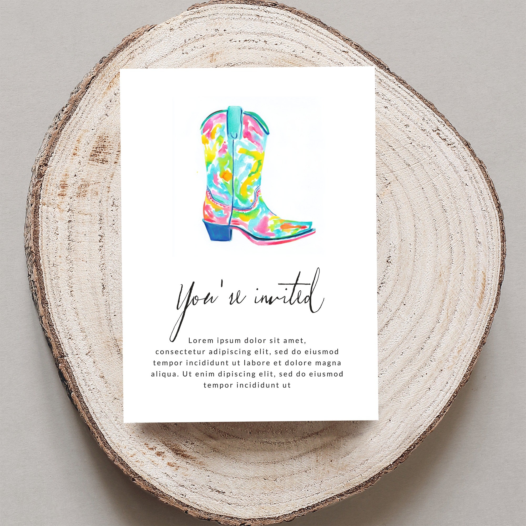 Colorful watercolor cowboy boot on a "You're invited" card.