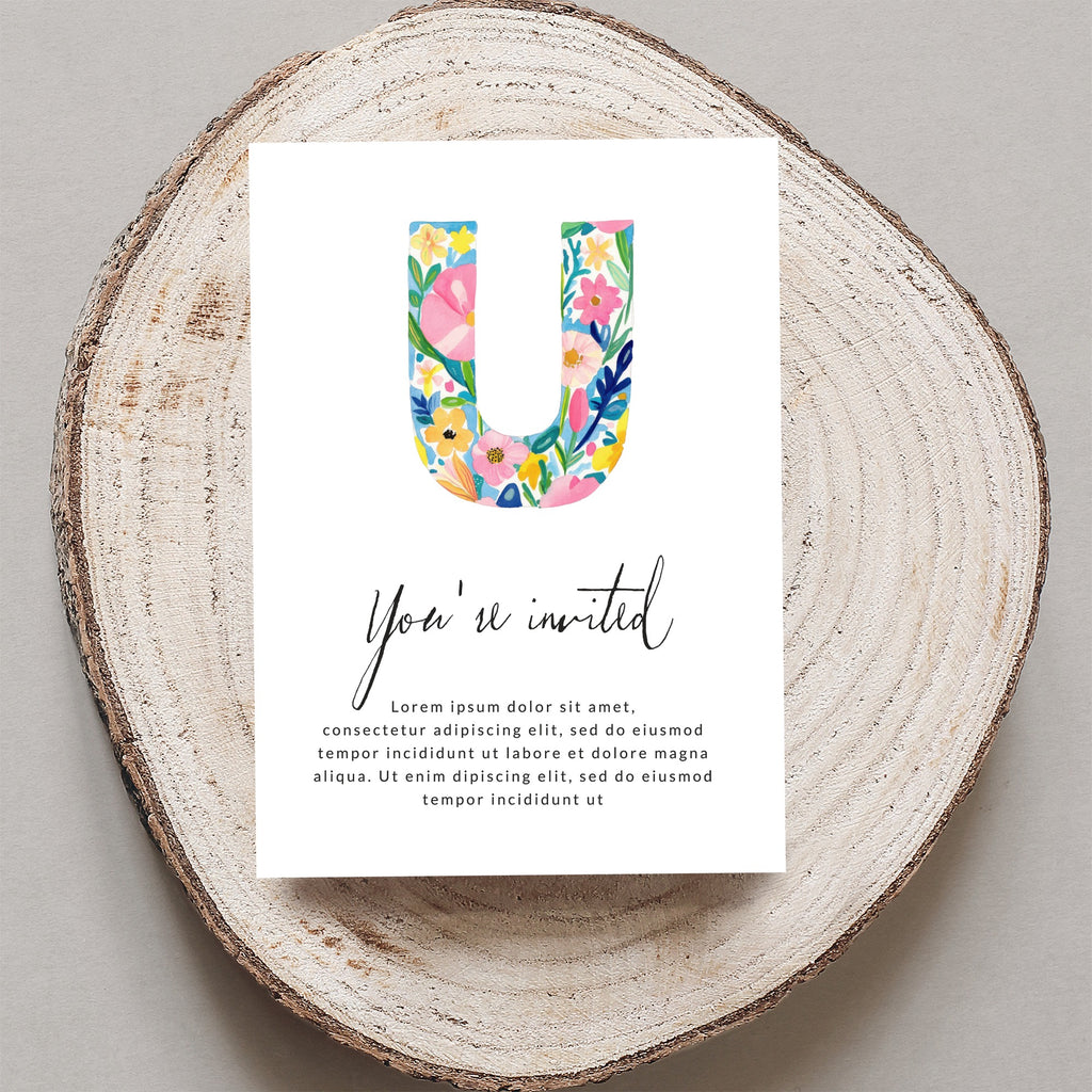 "You're invited" card with large floral letter U and placeholder text.