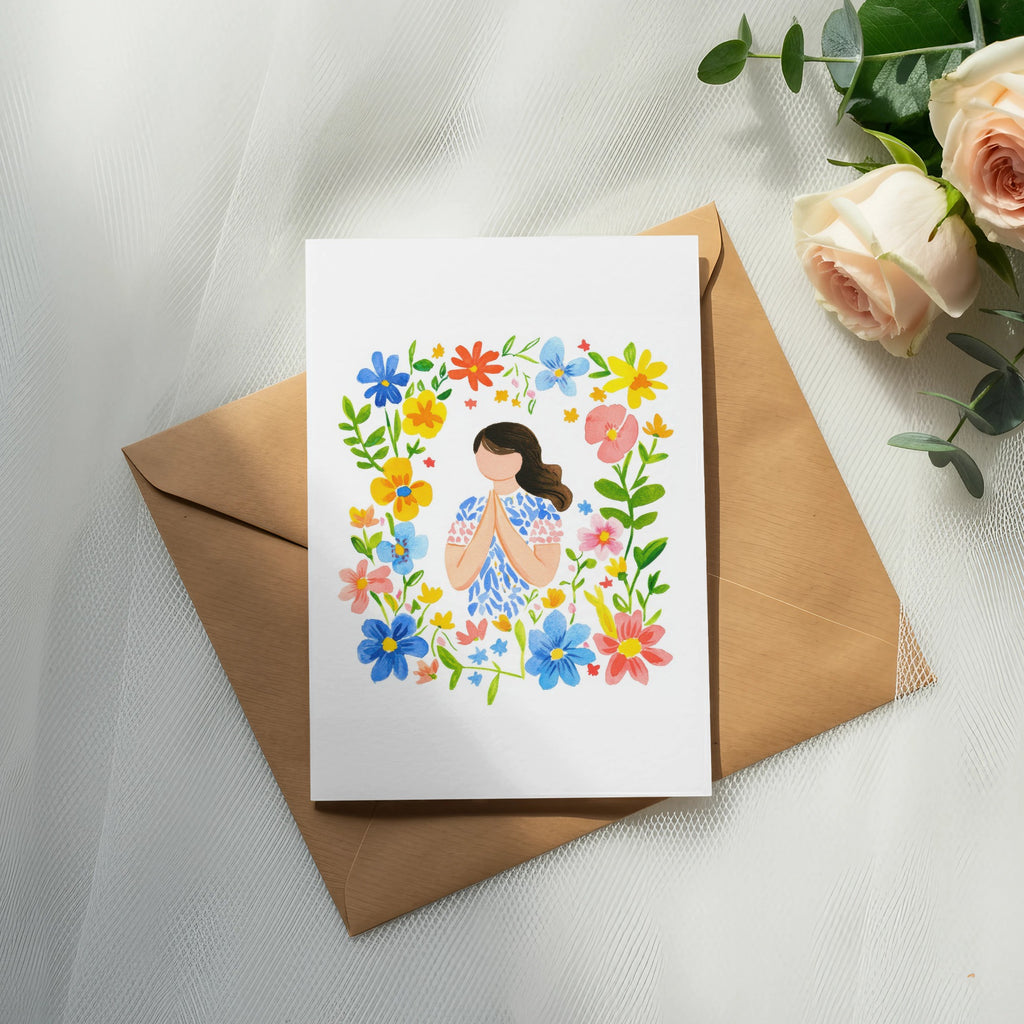 Card with woman in floral border on brown envelope, with roses.