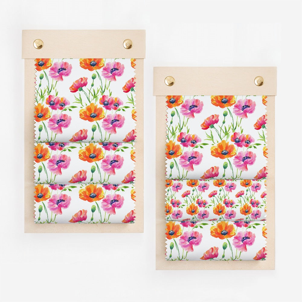 Fabric swatch samples with a repeating watercolor poppy floral pattern.