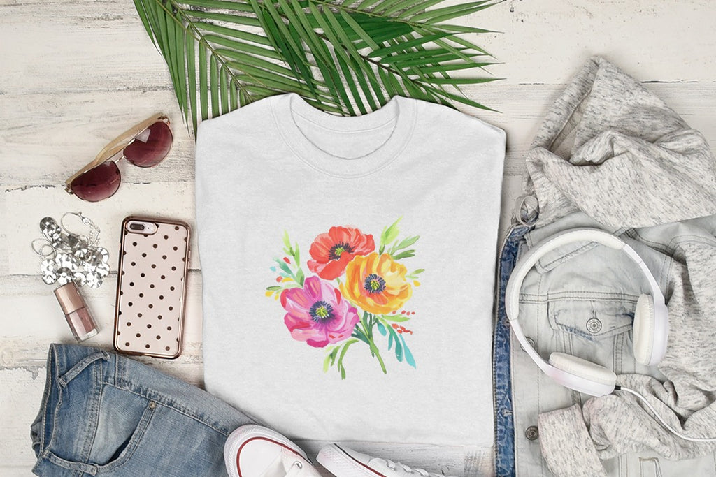 White t-shirt with watercolor poppies bouquet, sunglasses, headphones, and jeans.