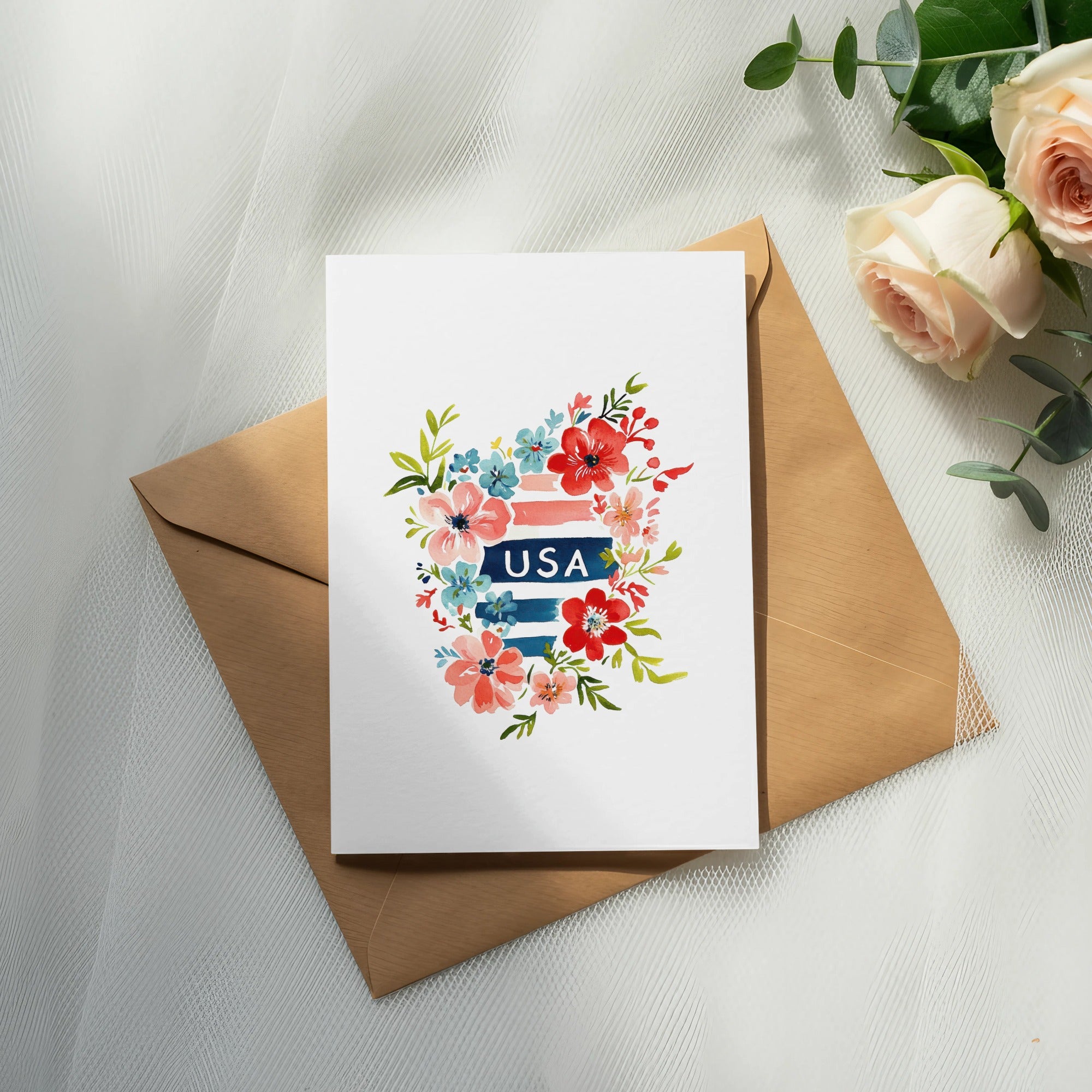 Greeting card with floral design and "USA" text, on a brown envelope.