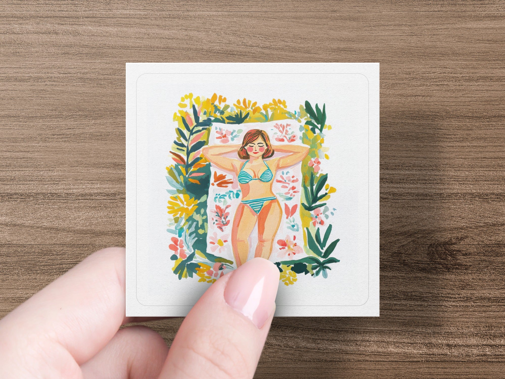 Woman in striped bikini sunbathing on a towel surrounded by flowers.