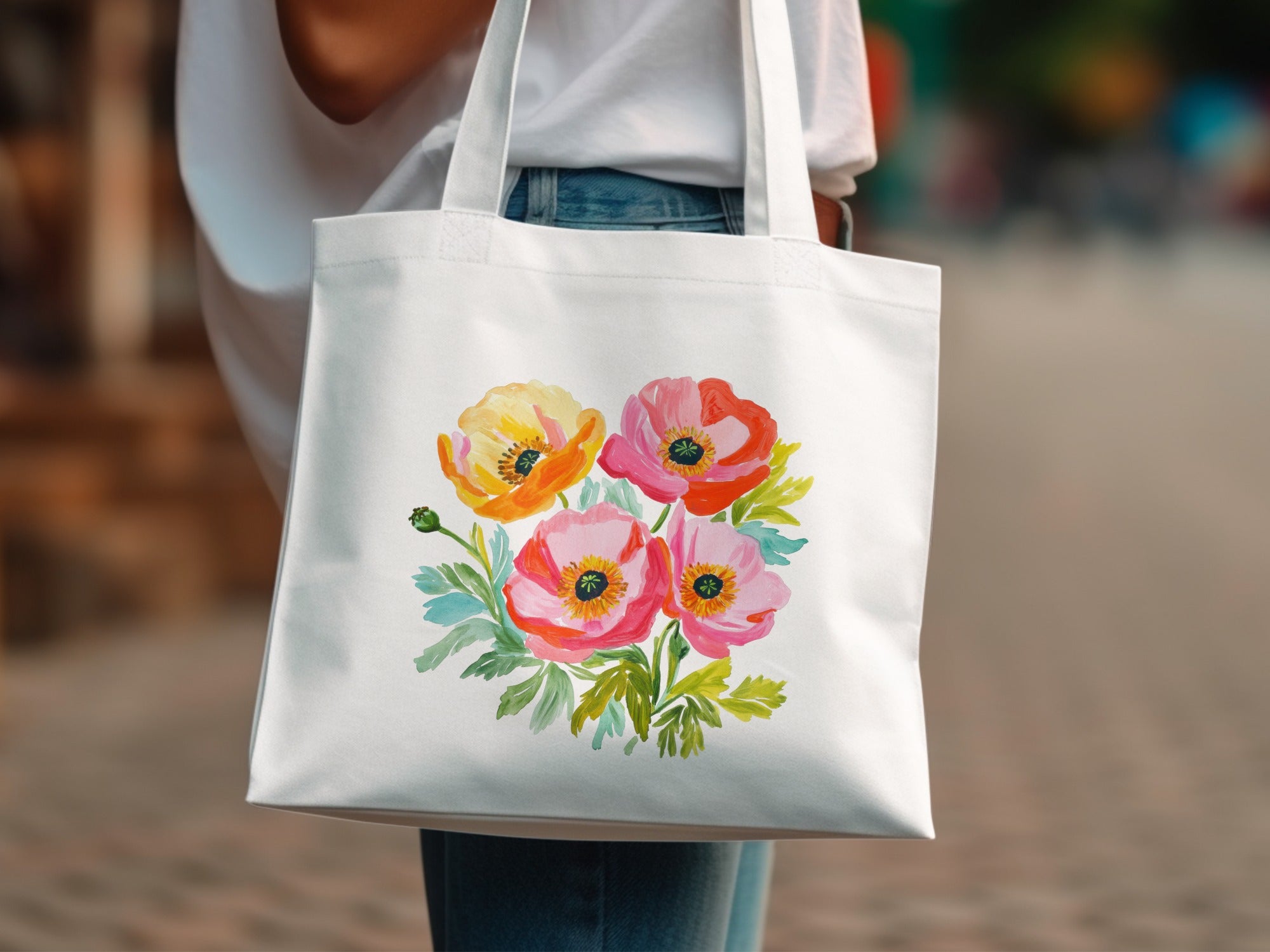 White canvas tote bag with watercolor floral poppy design.