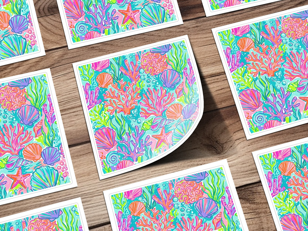 Colorful ocean coral, shells, and starfish illustration on multiple square cards.