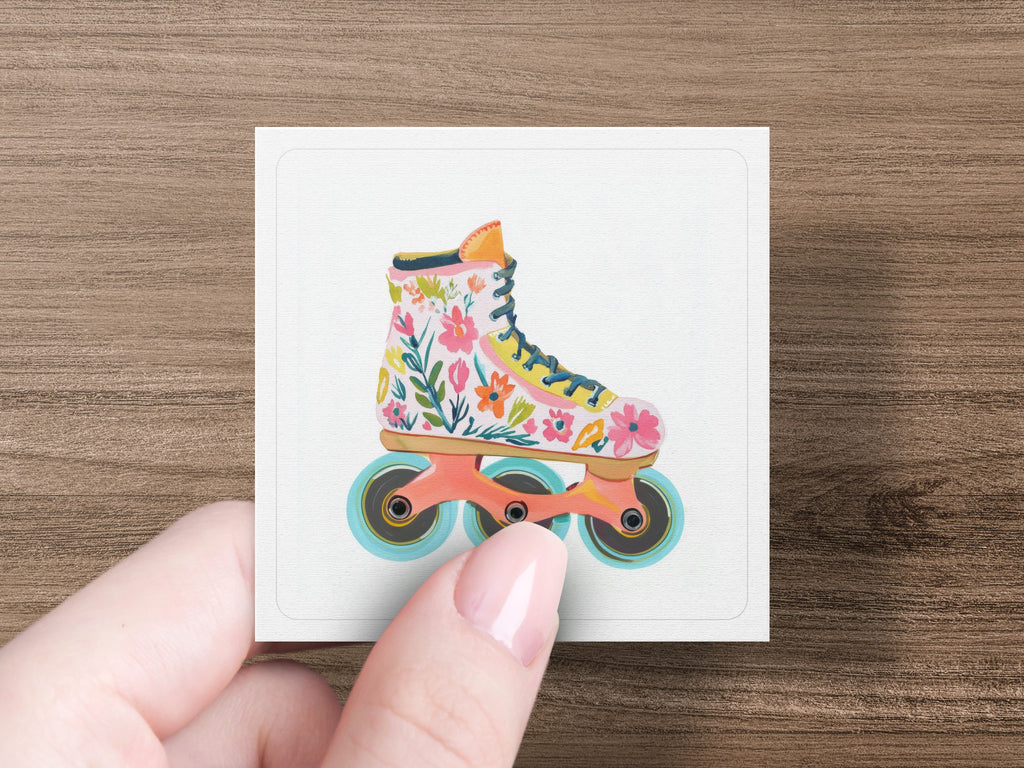 Floral roller skate illustration with teal wheels and pink laces.