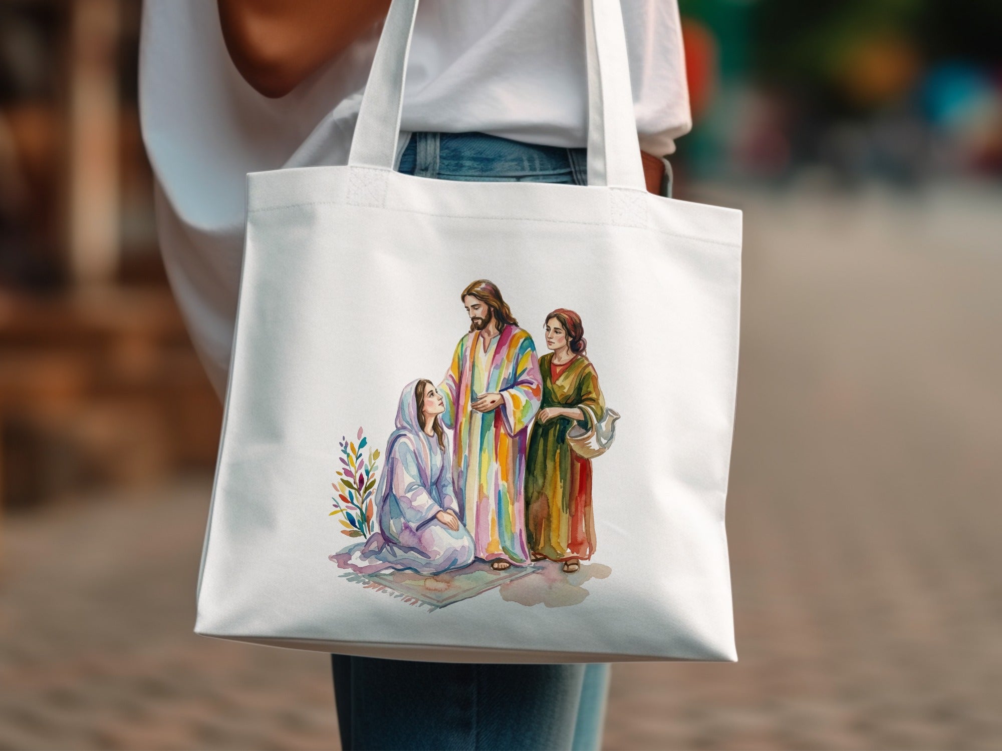 Religious illustration of Jesus Christ with two women on a white tote bag.