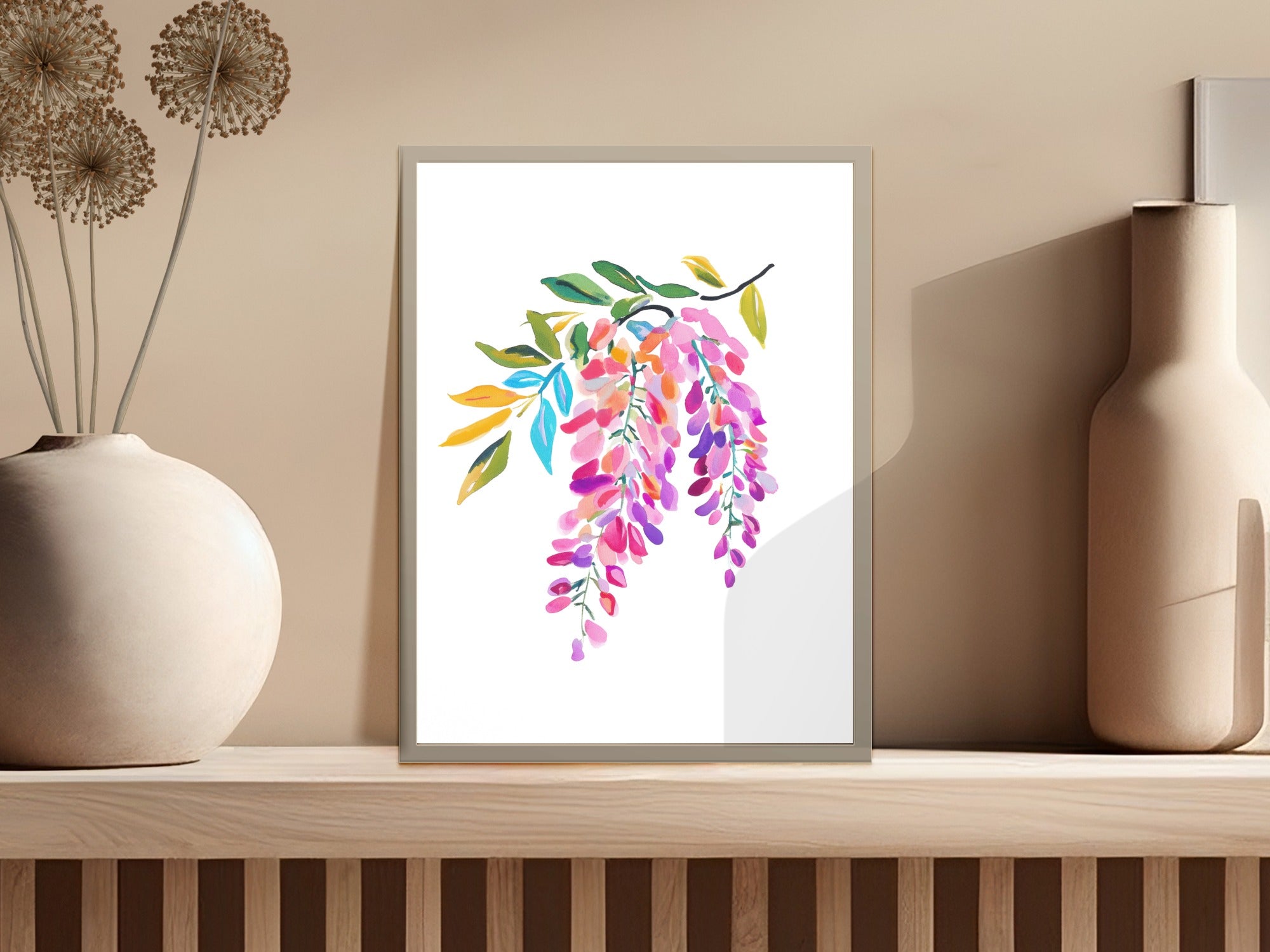Watercolor wisteria blossoms in shades of pink and purple hang from branches.
