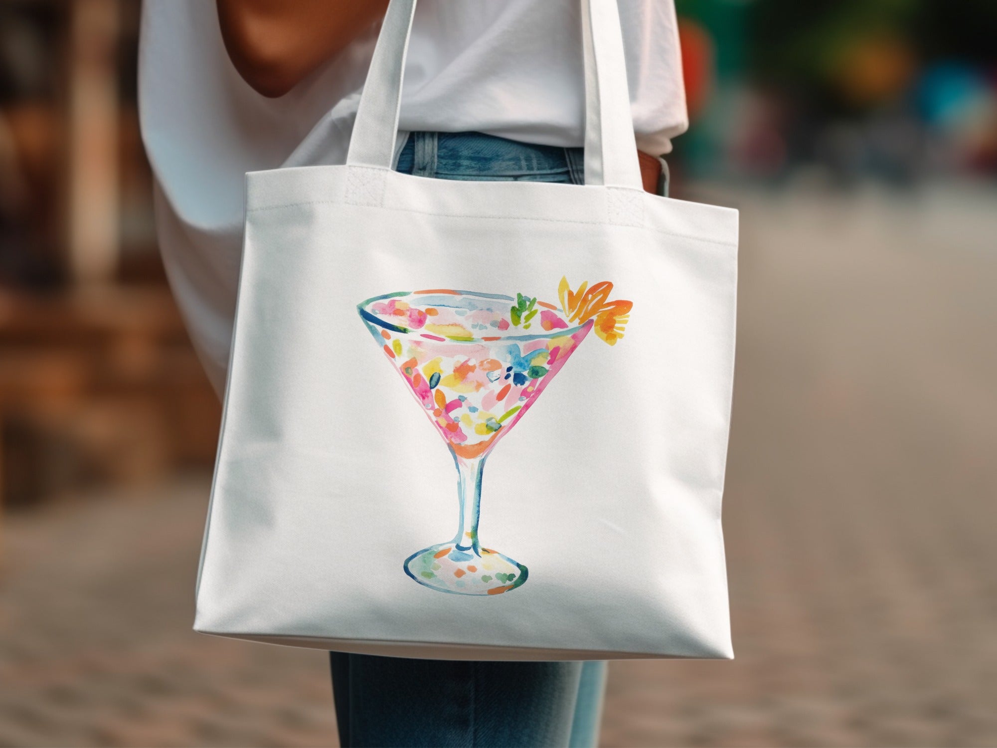 White tote bag with watercolor martini glass illustration and colorful confetti.