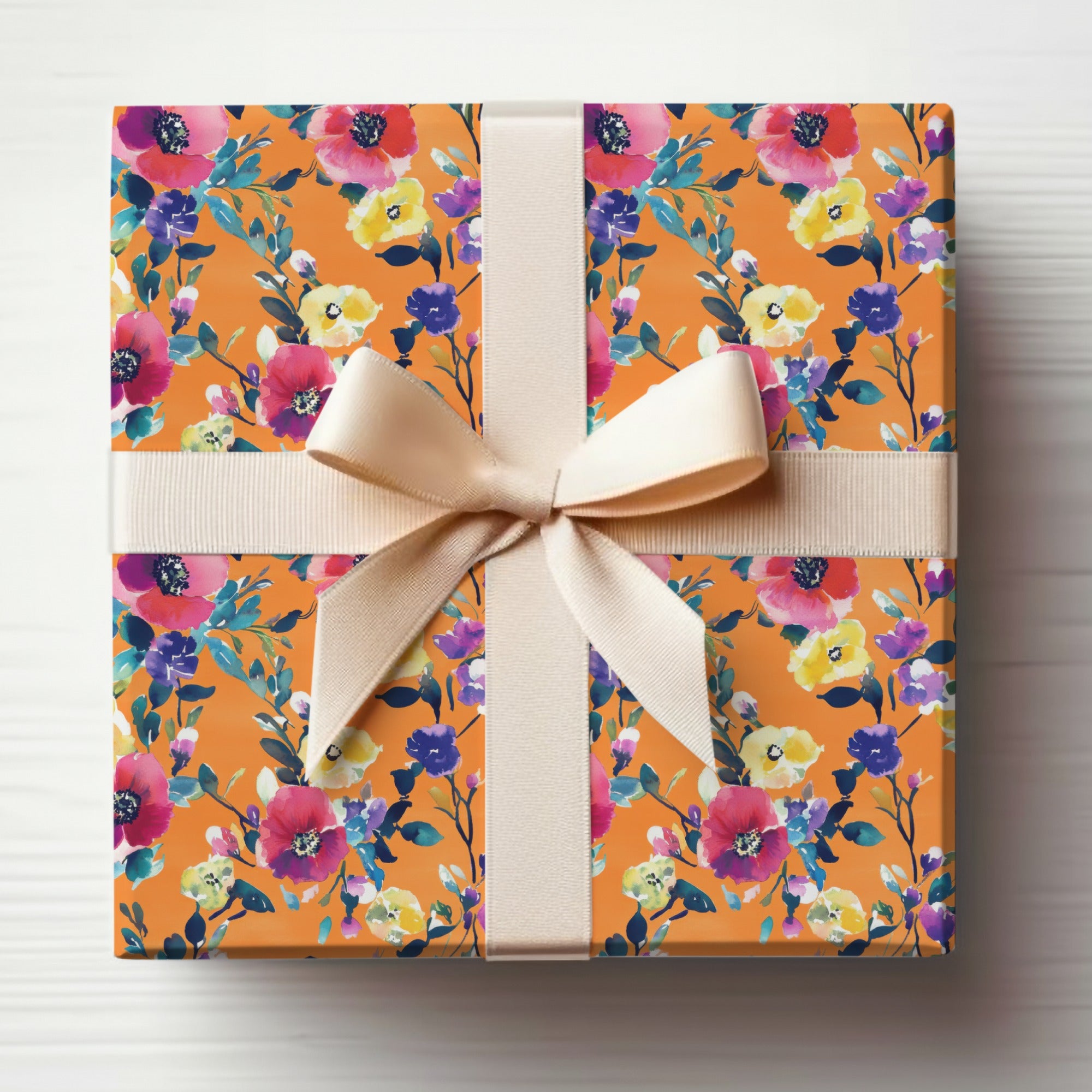 Floral Print Gift Wrap with Elegant Ribbon Packaging