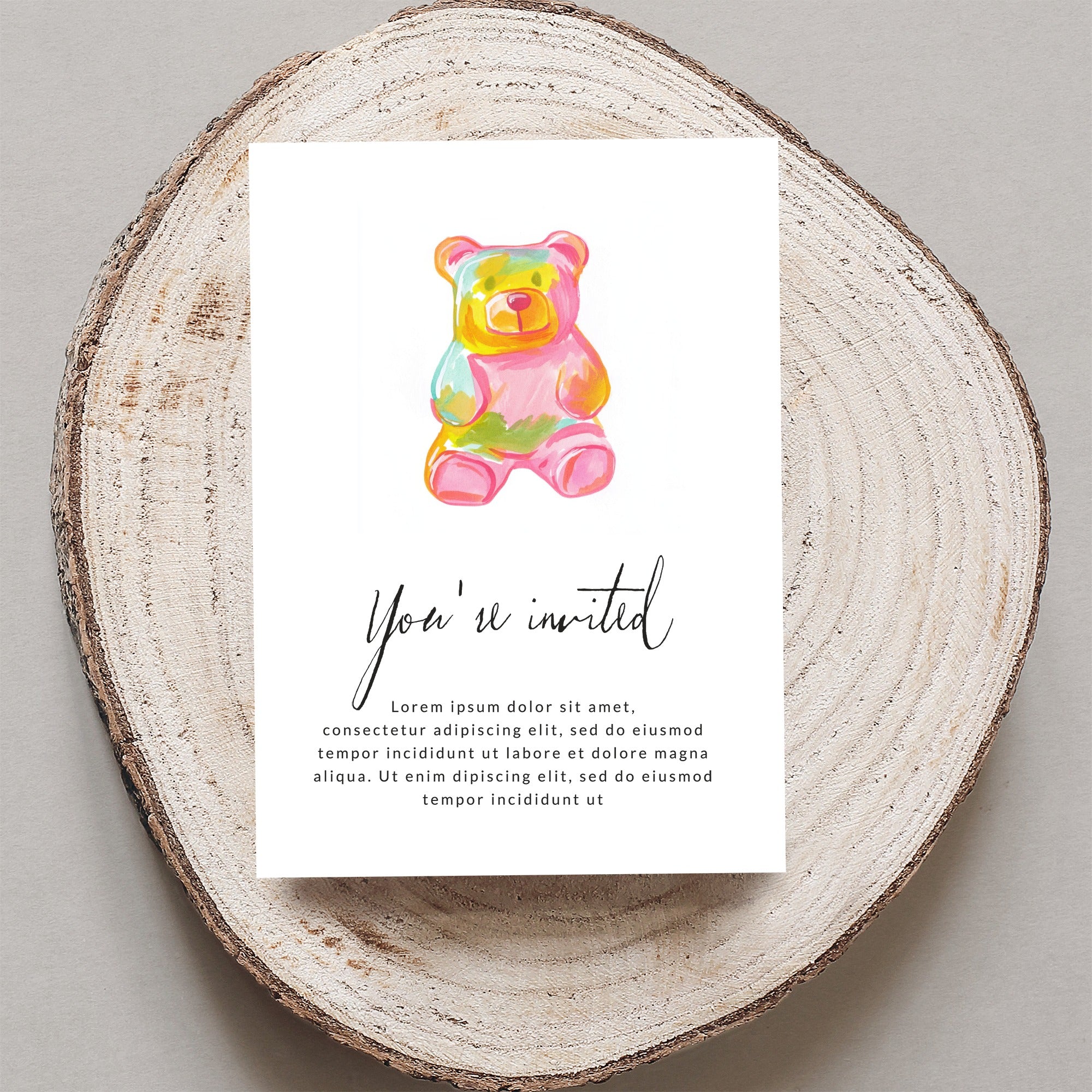 Gummy bear invitation with "You're invited" text and placeholder lorem ipsum.